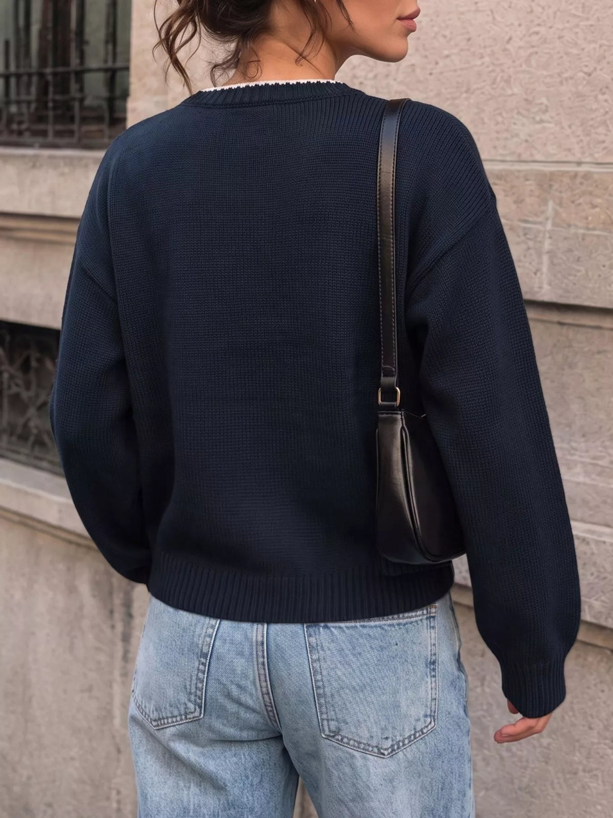Navy swan sweater, swan design detail