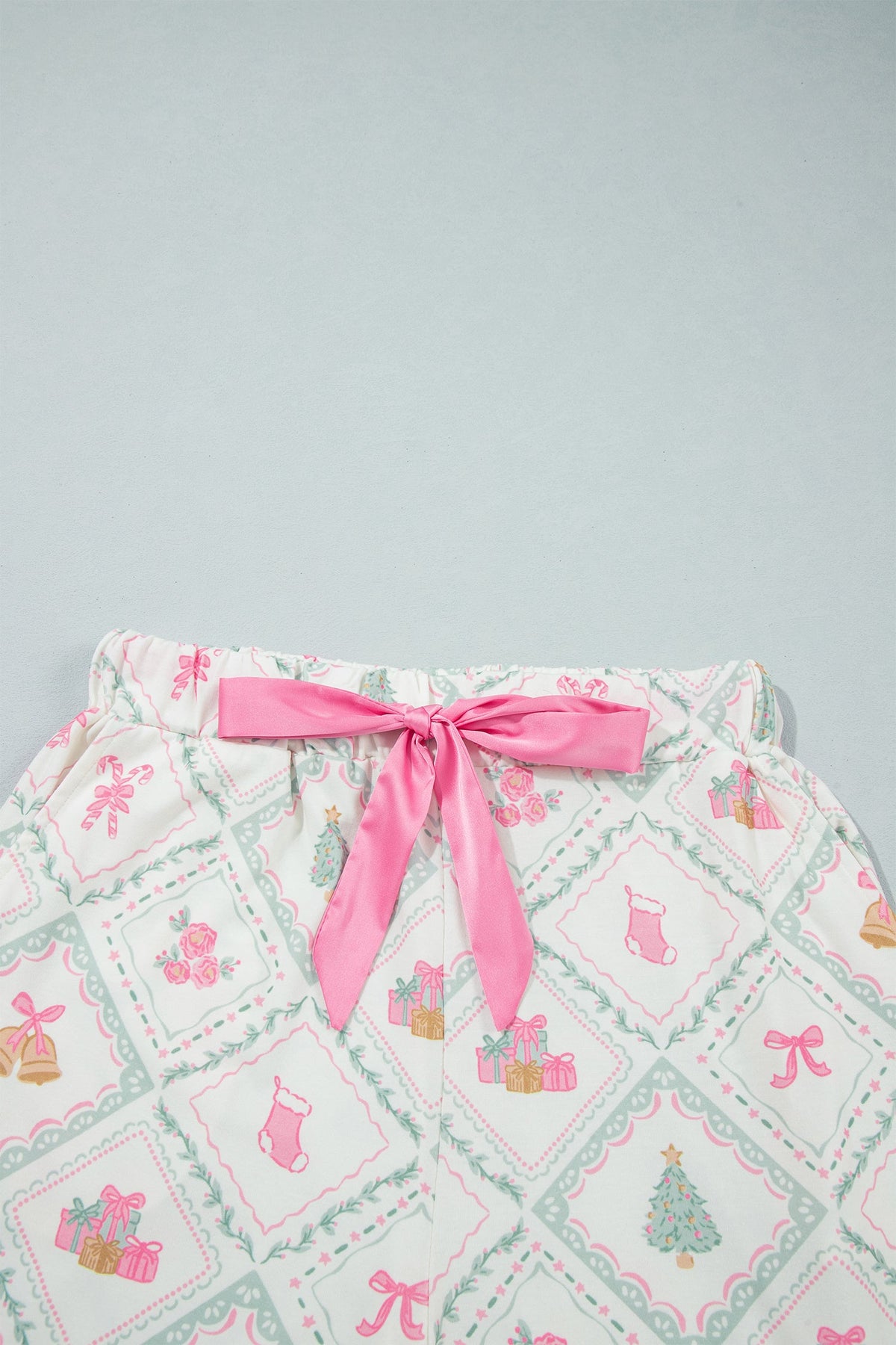 Christmas Patchwork Henley Pajama Set in white, close-up print detail