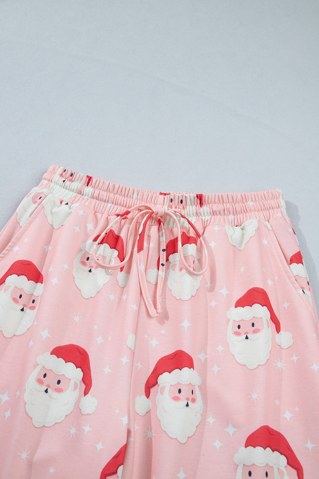 Christmas Santa Raglan Pajama Set in pink, close-up print detail