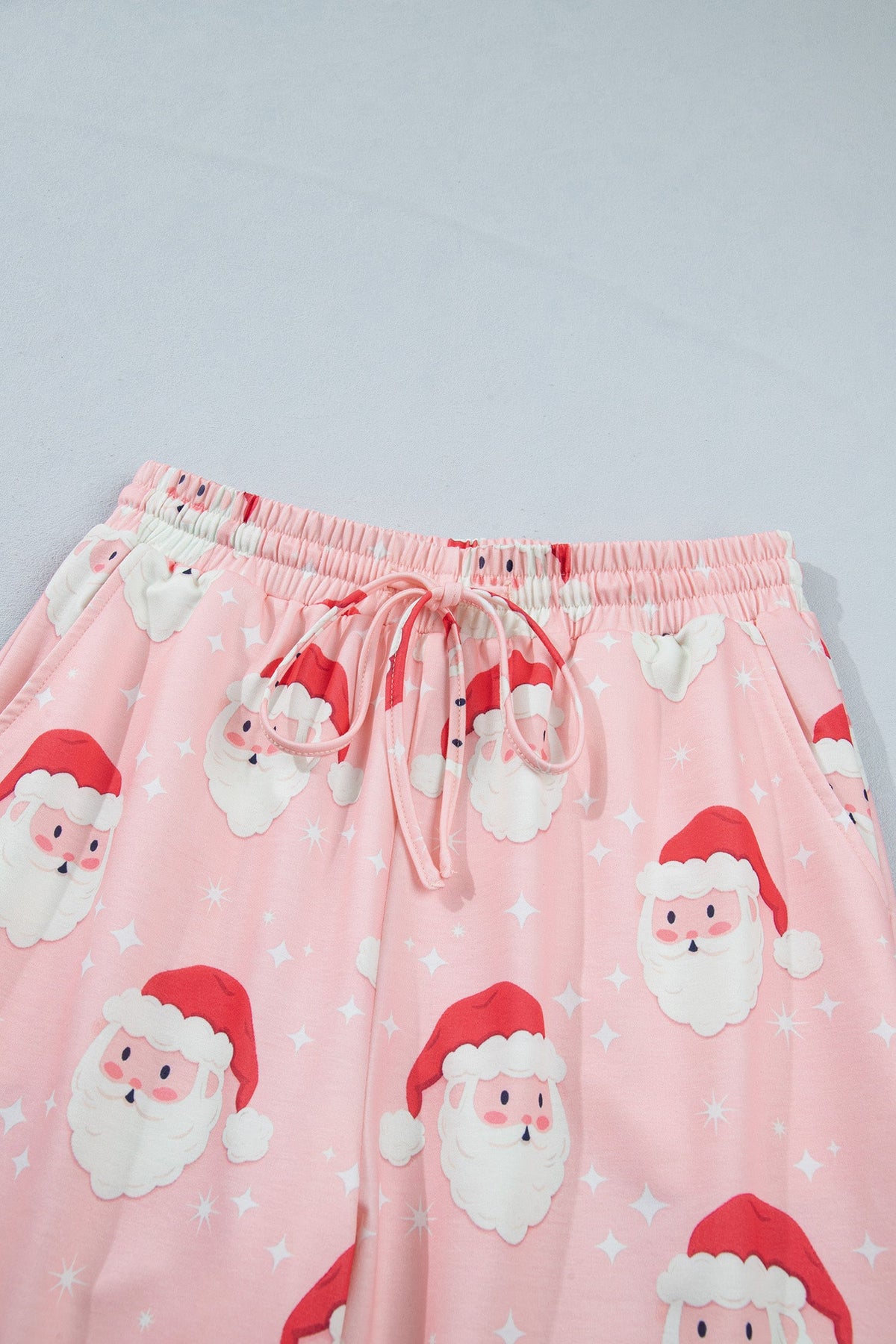 Christmas Santa Raglan Pajama Set in pink, close-up print detail