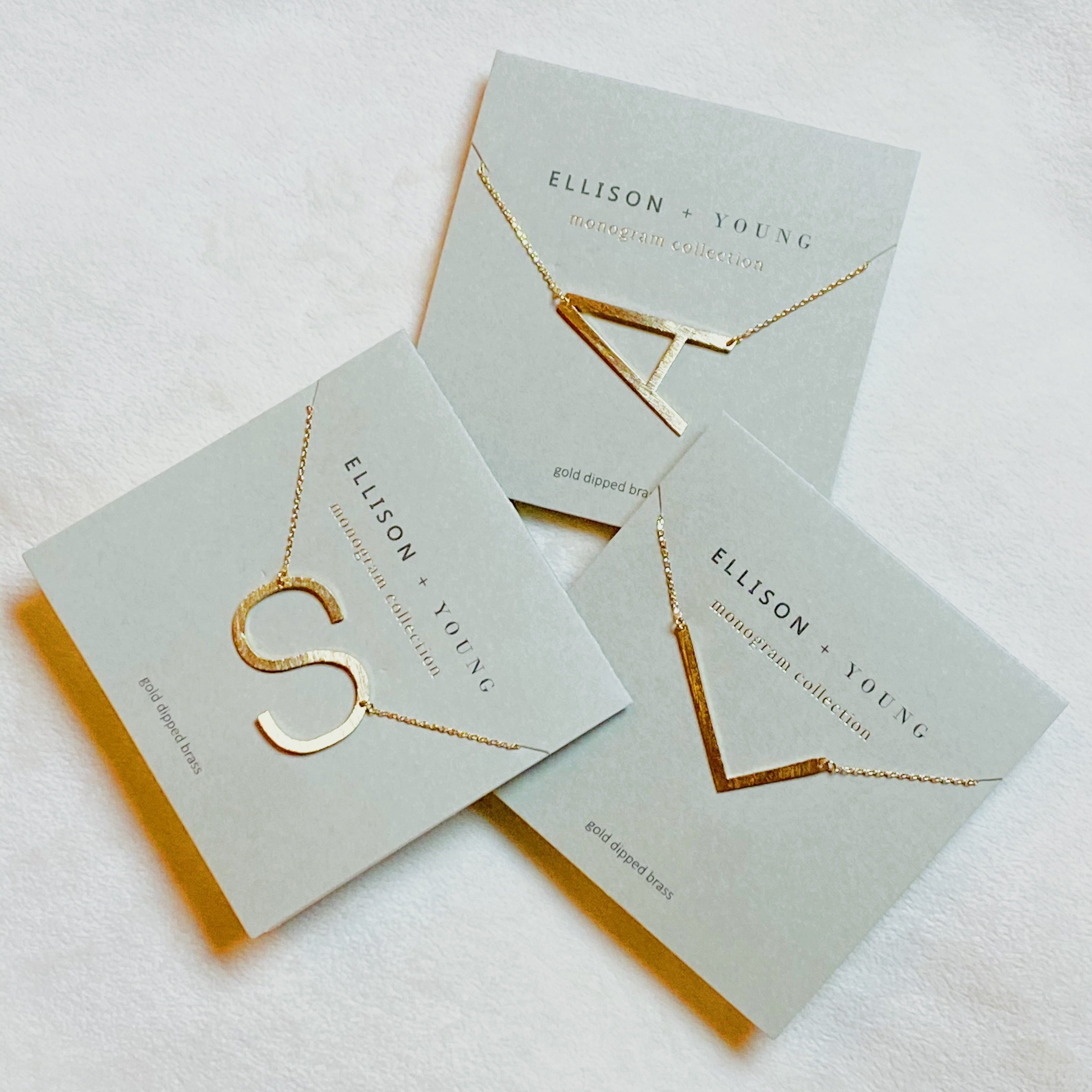 Monogram Collection Initial Necklace - multiple letter options flat lay