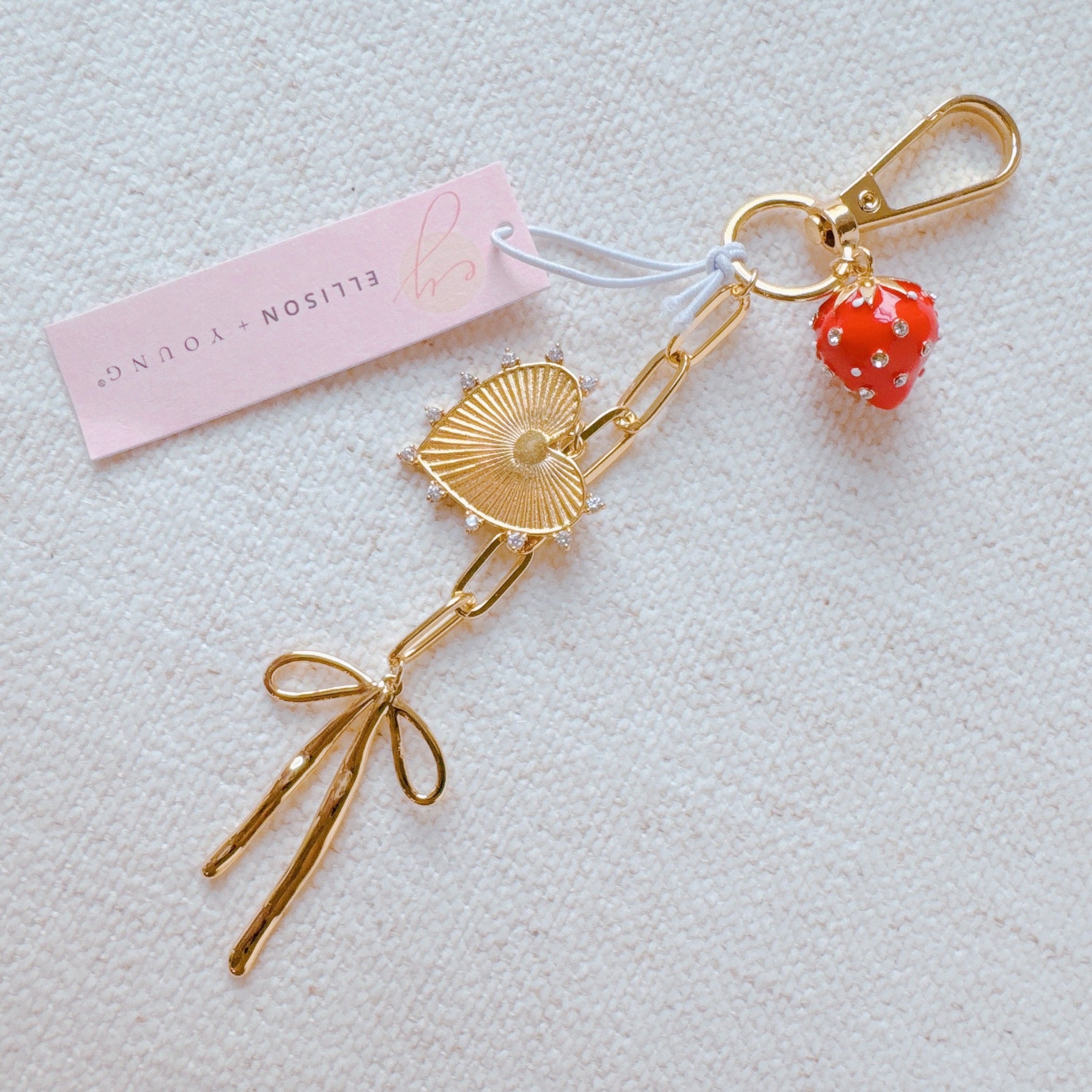 All The Sweetness Bag Charm - close up of heart and bow detail