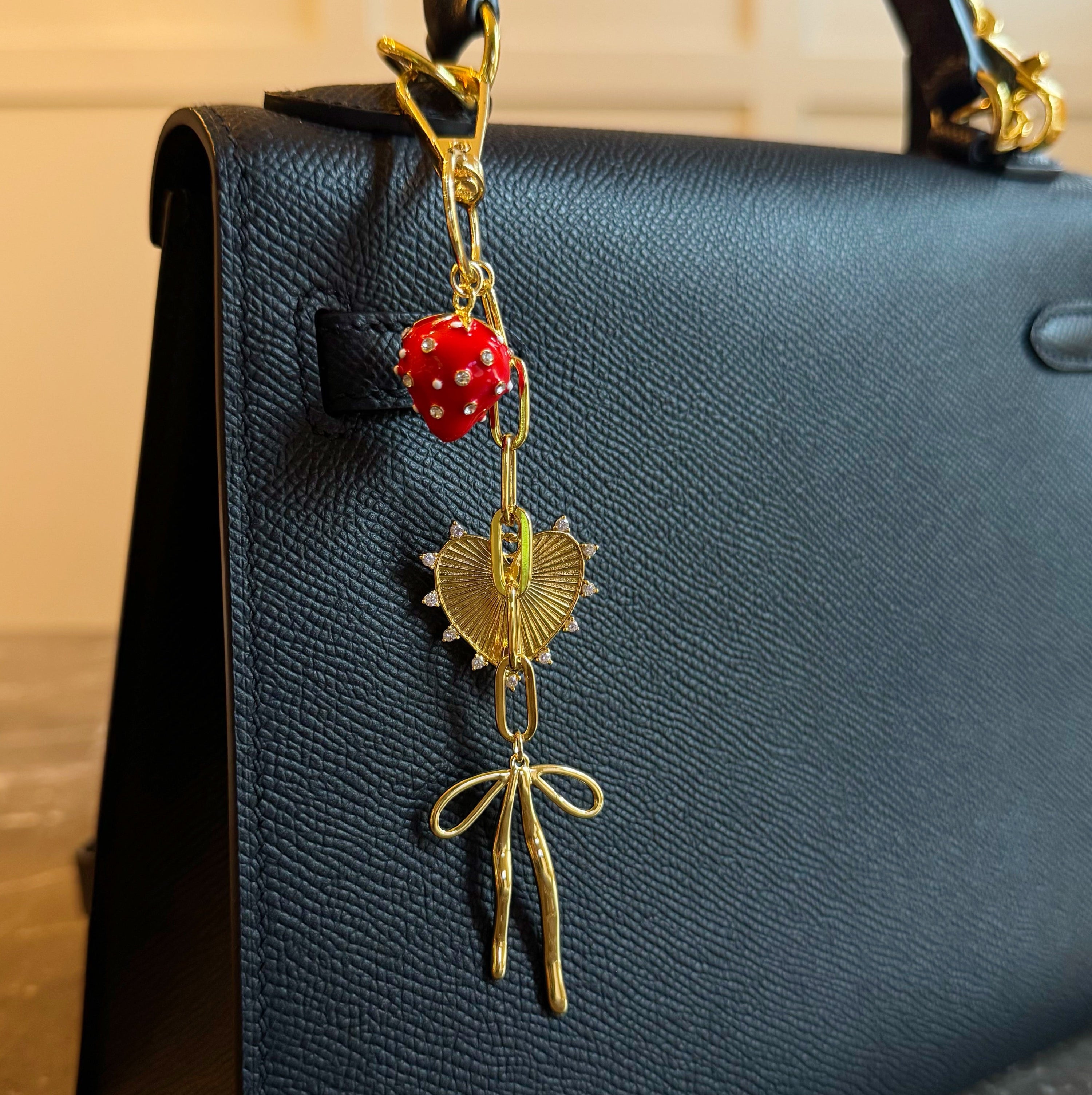All The Sweetness Bag Charm - heart and bow charm in gold tone