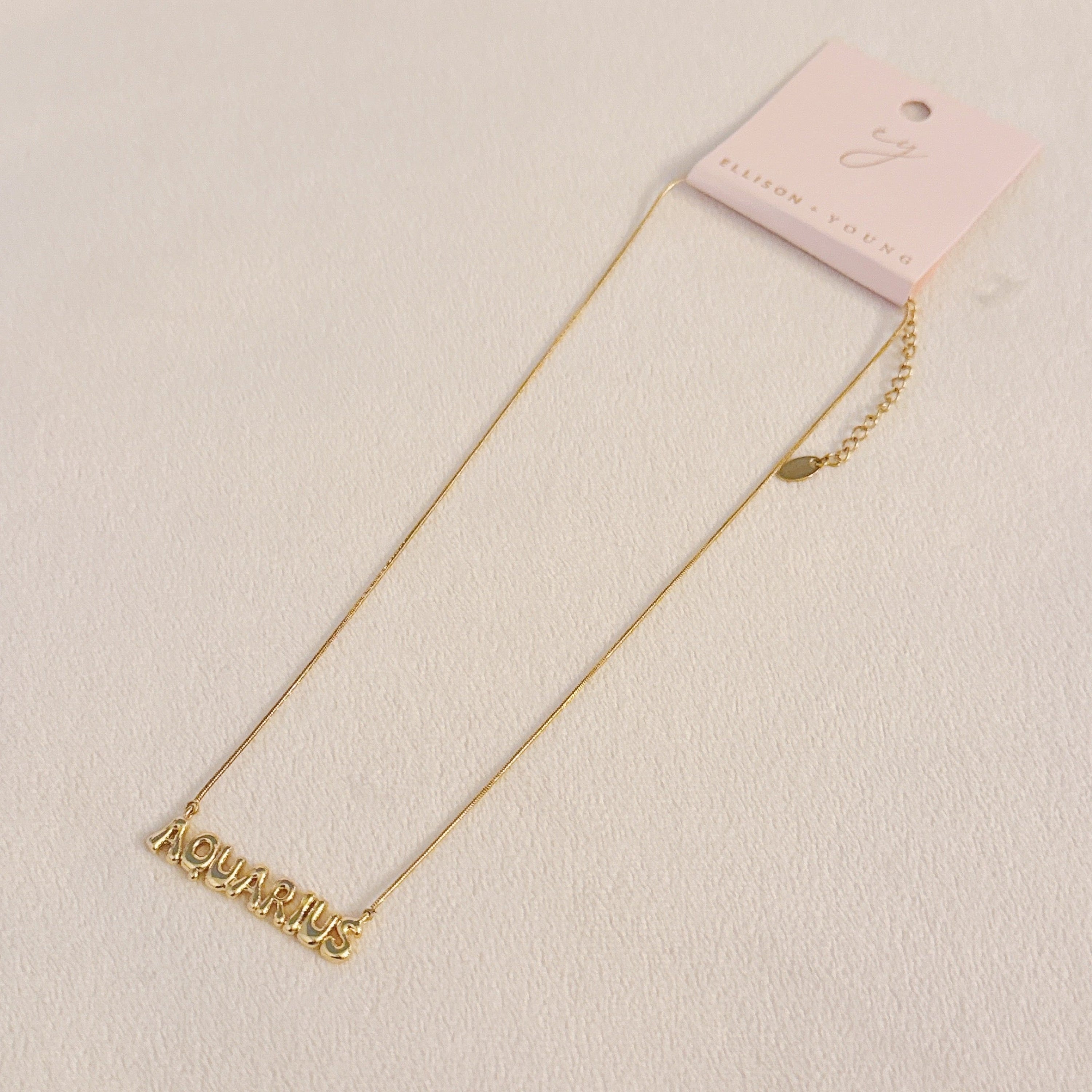 Balloon Letter Zodiac Necklace - close up of zodiac balloon letter pendant