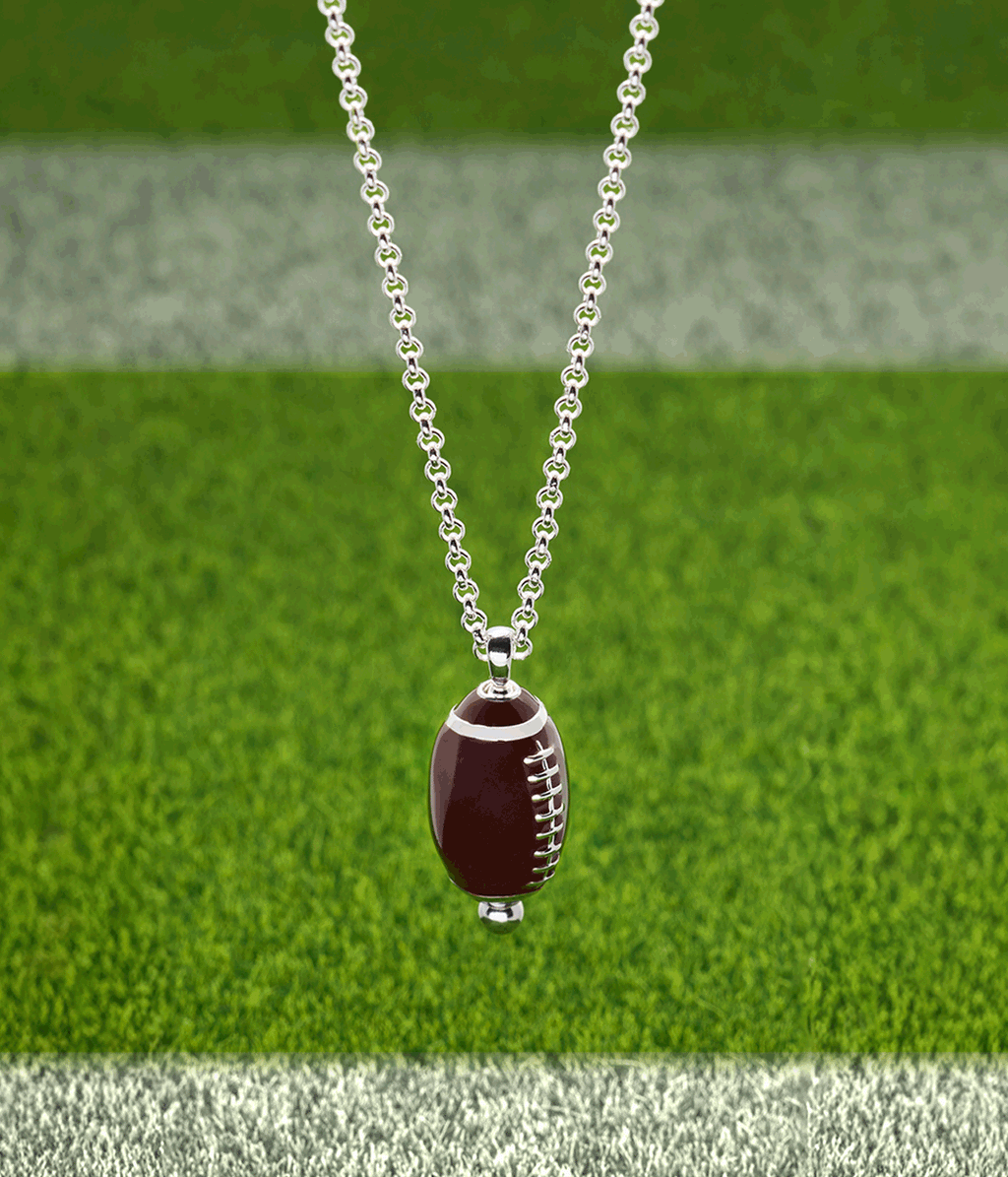 Football Spinner Pendant Necklace - close up of spinning football charm