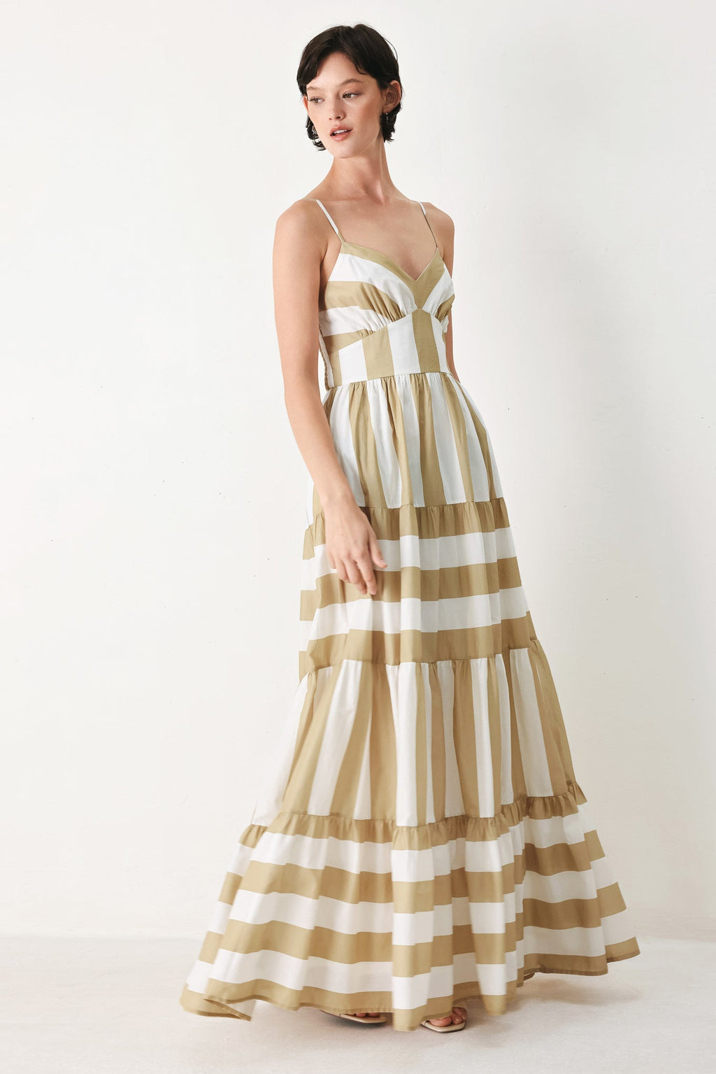 Sunkissed Boardwalk Woven Maxi Dress in Taupe White with stripe print, cami-style bodice, smocked back, and tiered skirt shown on model