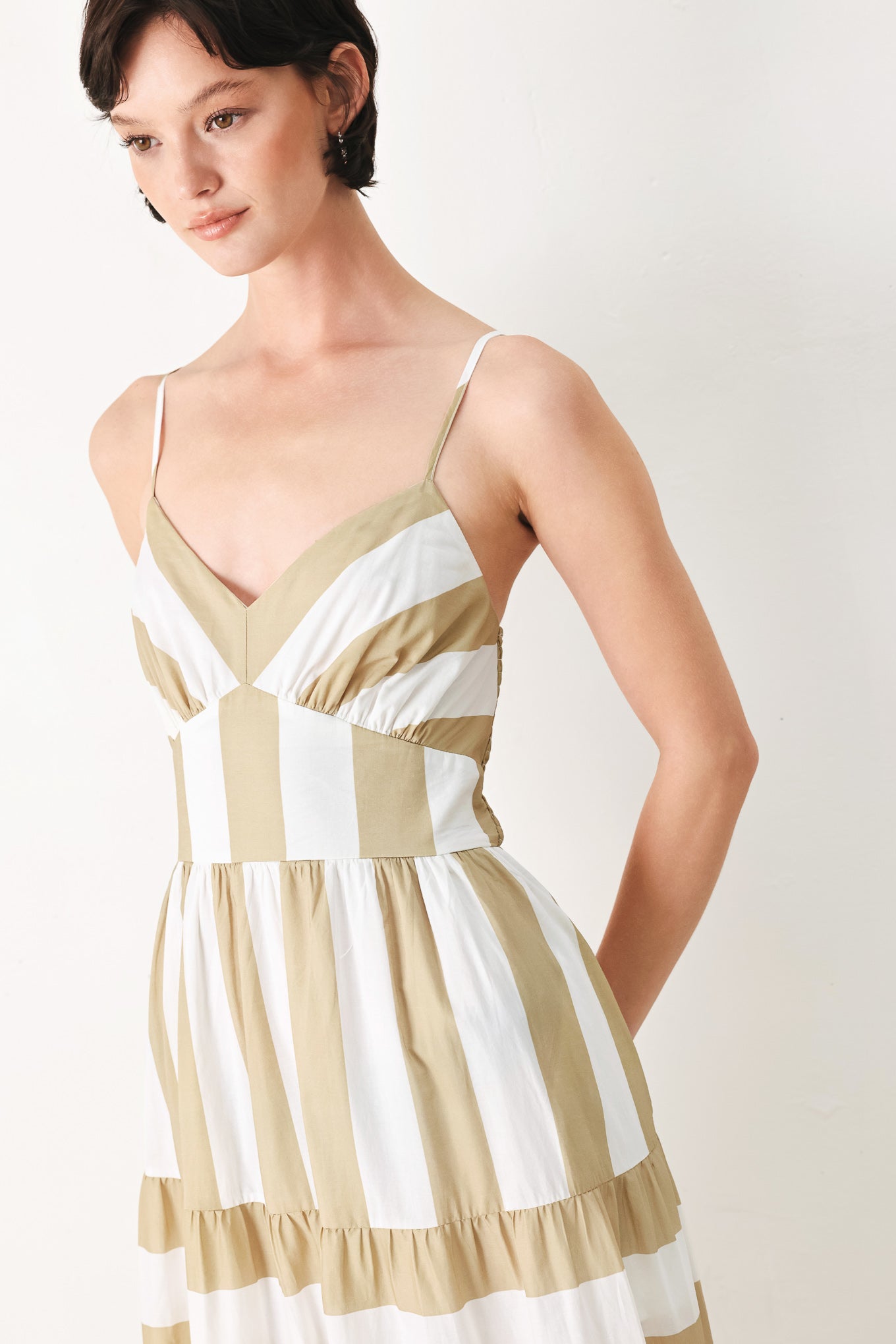Sunkissed Boardwalk Woven Maxi Dress in Taupe White with stripe print, cami-style bodice, smocked back, and tiered skirt shown on model