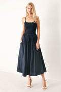 Easy Breeze Navy Woven Midi Dress with ribbed sweater knit tank top, solid woven skirt, bare back, and lace-up tie detail shown on model