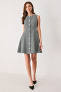 Houndstooth Sequin Skater Mini Dress in black and white, front view