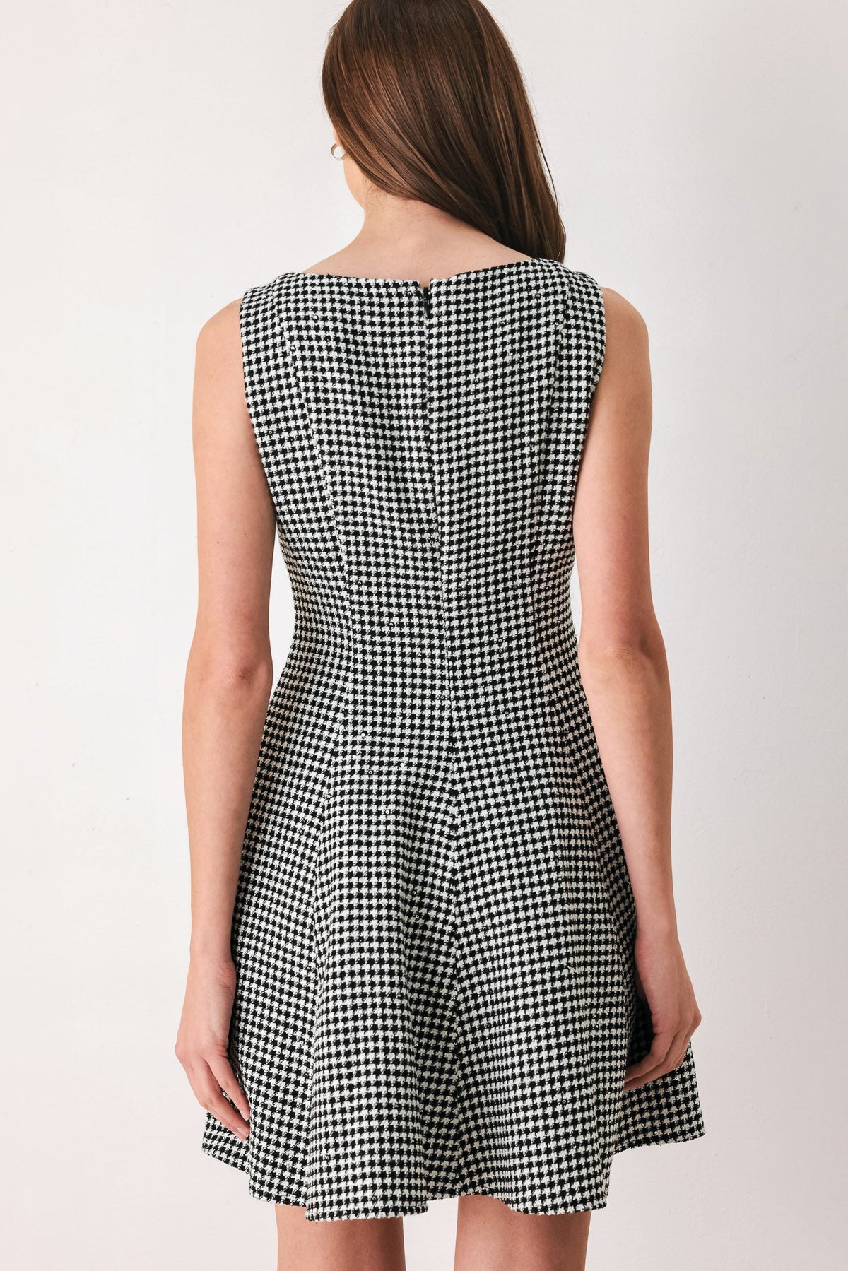 Houndstooth Sequin Skater Mini Dress in black and white, close-up detail