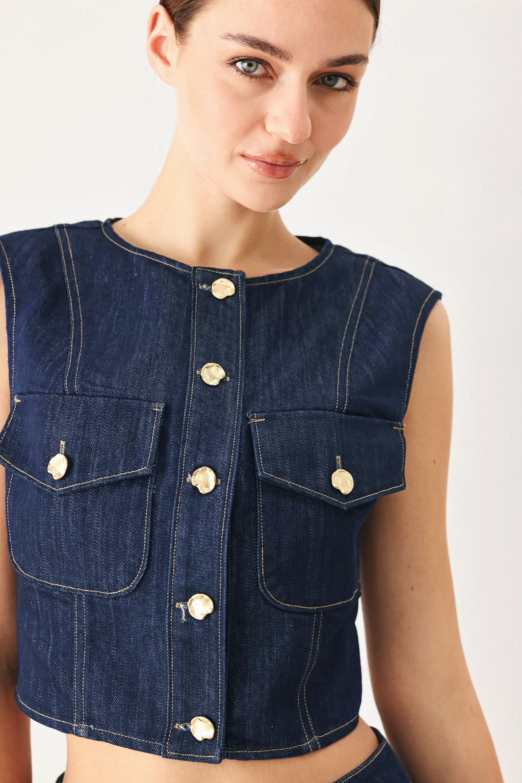 Iconic Indigo Denim Crop Vest with front button closure