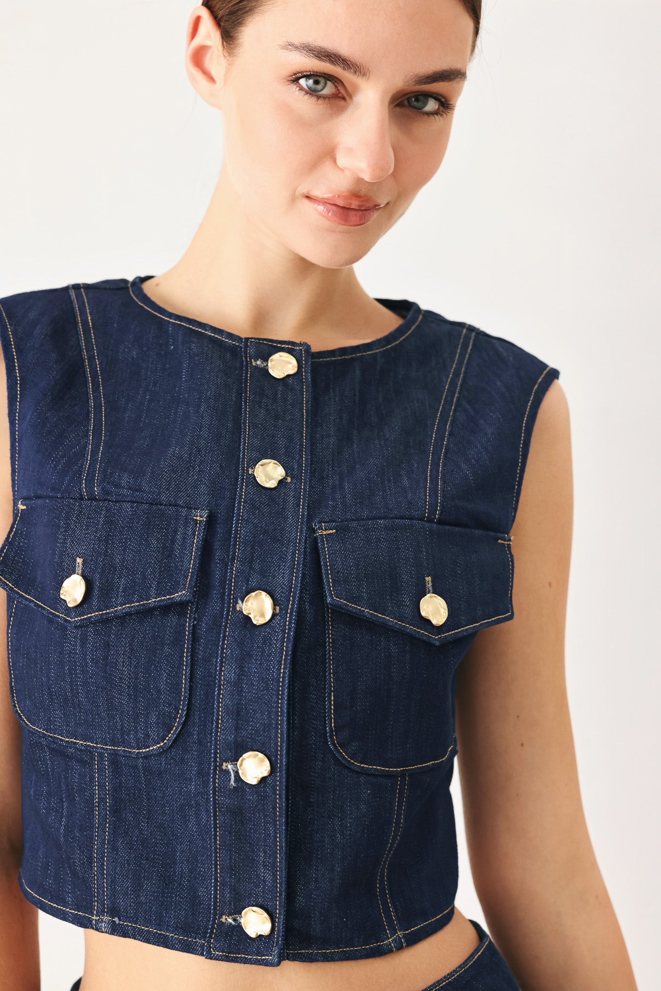 Iconic Indigo Denim Crop Vest with front button closure