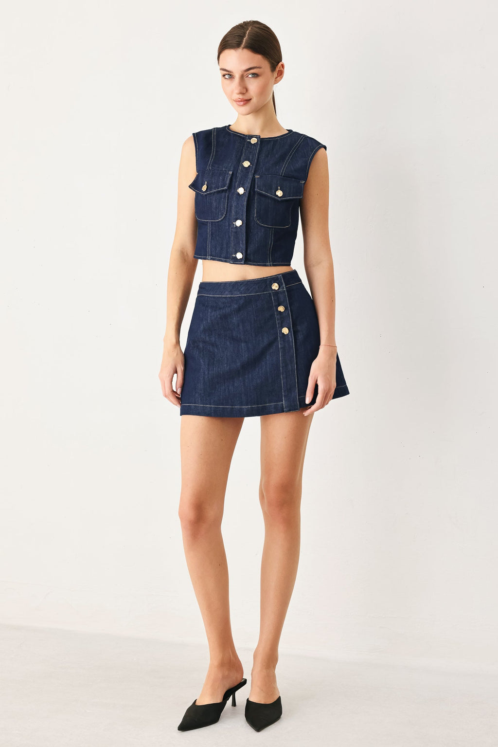 Indigo denim crop vest, tailored silhouette, 70% cotton 30% polyester