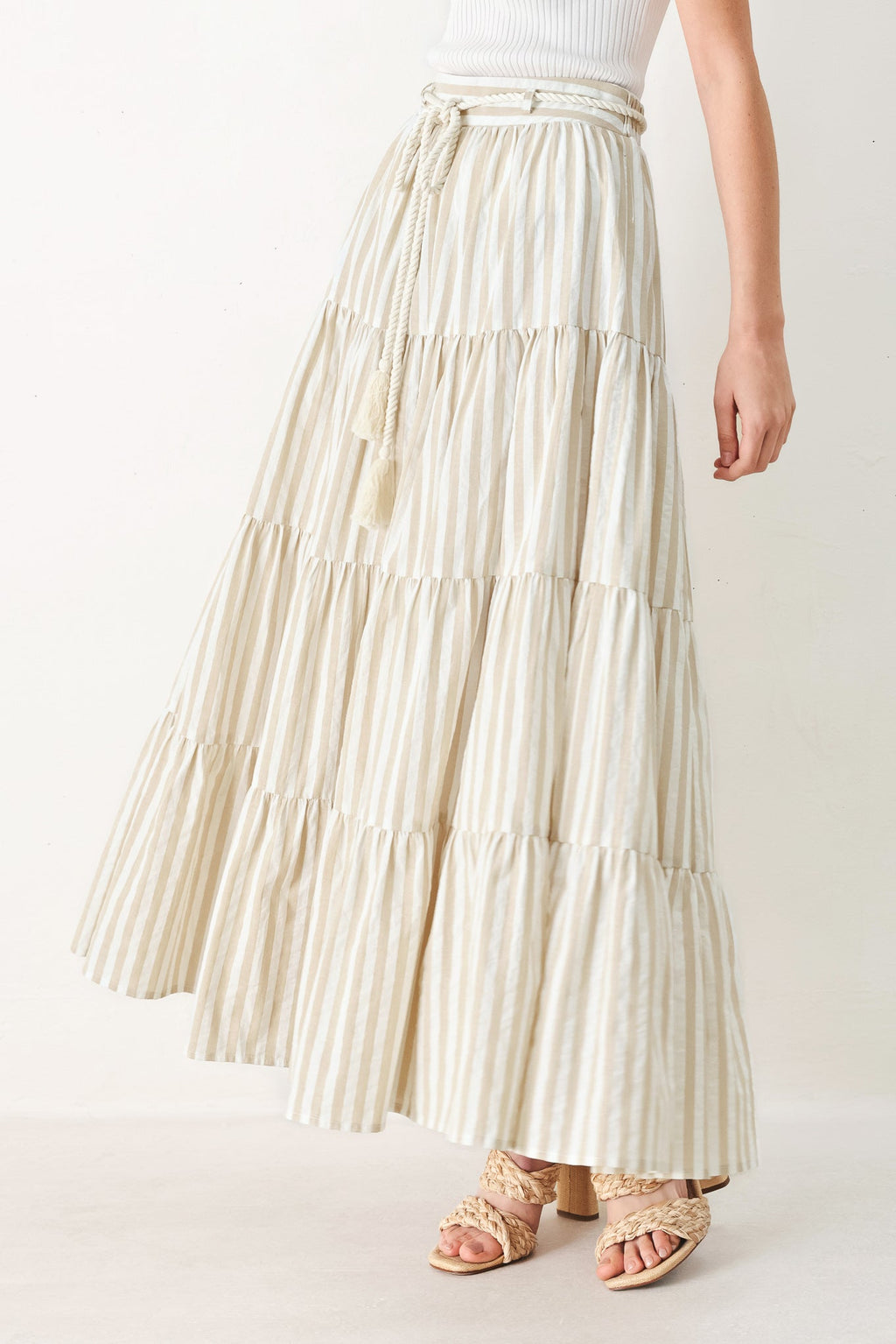 Hamptons Weekend Woven Maxi Skirt in Taupe White with stripe print, tiered layers, rope belt, and elastic back waistband shown on model