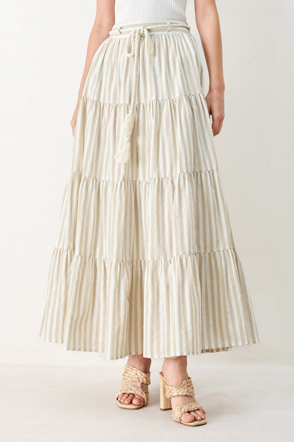 Hamptons Weekend Woven Maxi Skirt in Taupe White with stripe print, tiered layers, rope belt, and elastic back waistband shown on model
