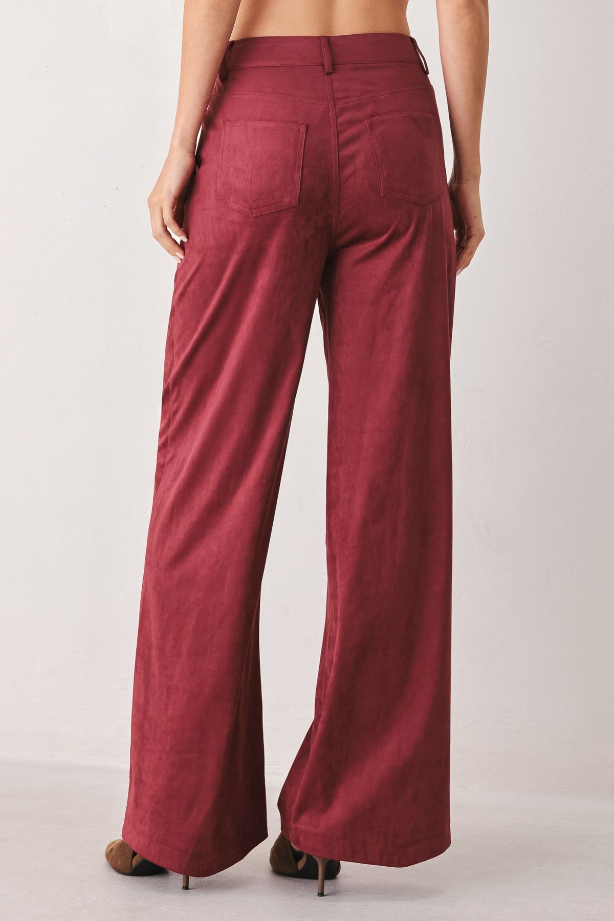 Faux Suede Flare Pants in maroon and brown, lifestyle view