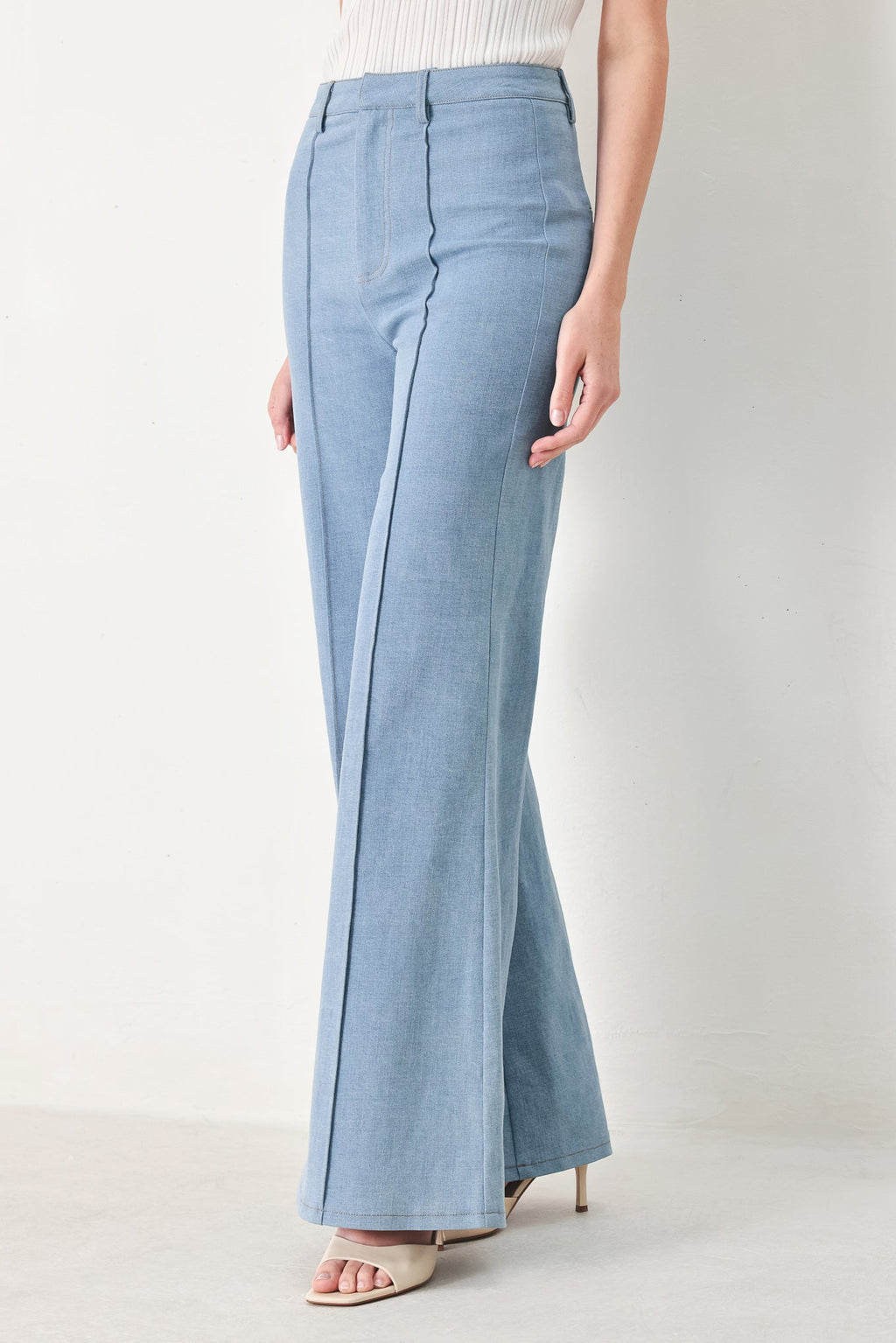 Luna Flare Woven Pants in Light Denim - close up of woven fabric and front closure