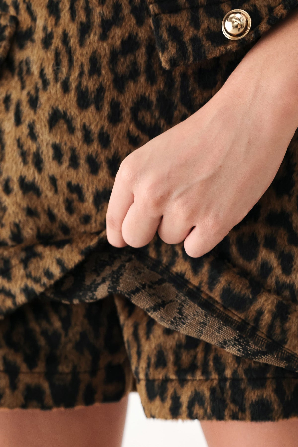 Leopard Wool Blend Mini Skort in brown and black leopard, detail view