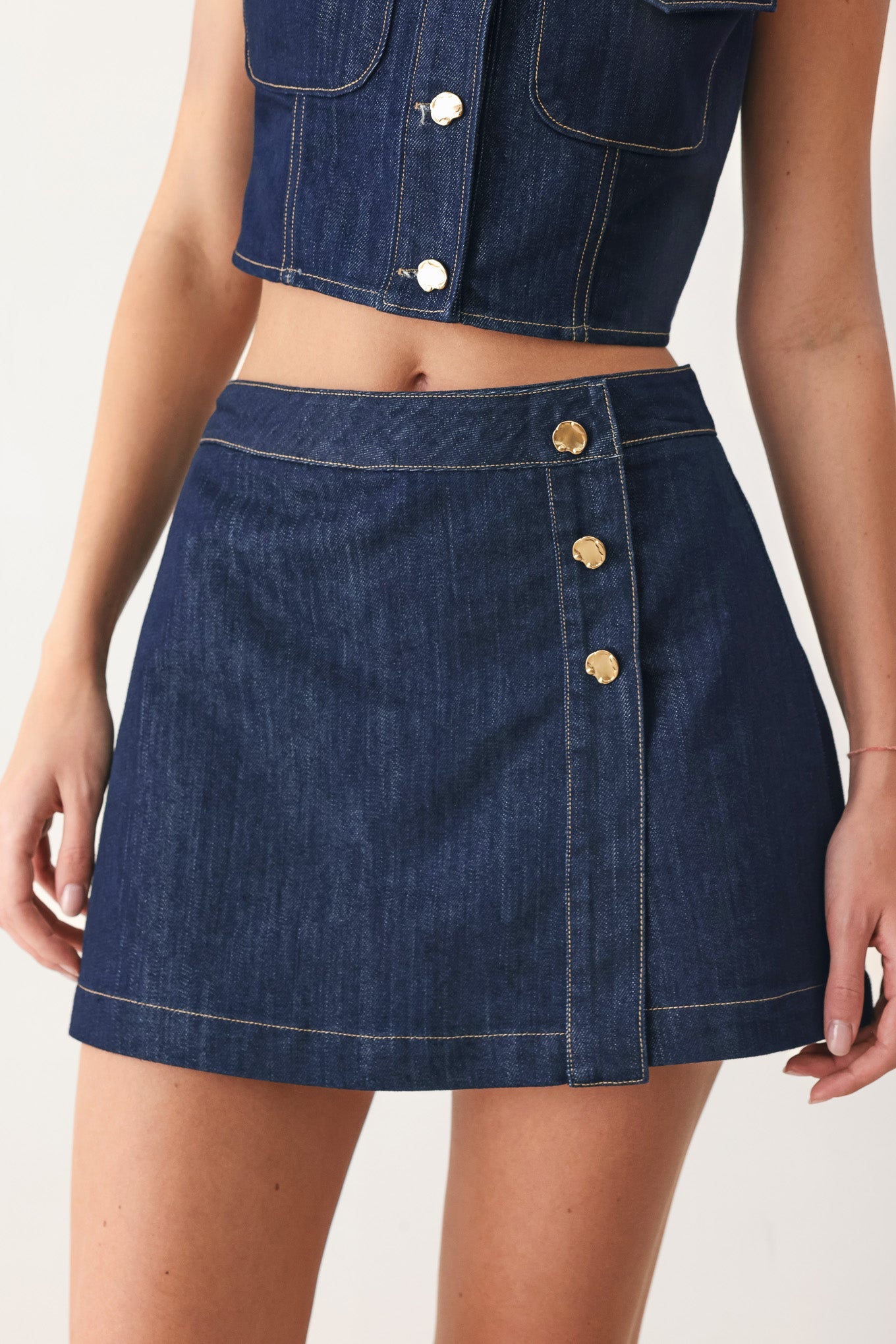 Iconic Indigo Denim Skort with front closure and button details