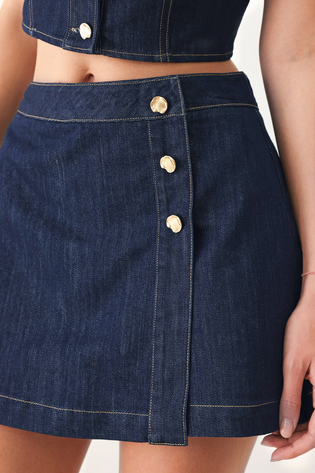 Iconic Indigo Denim Skort with front closure and button details