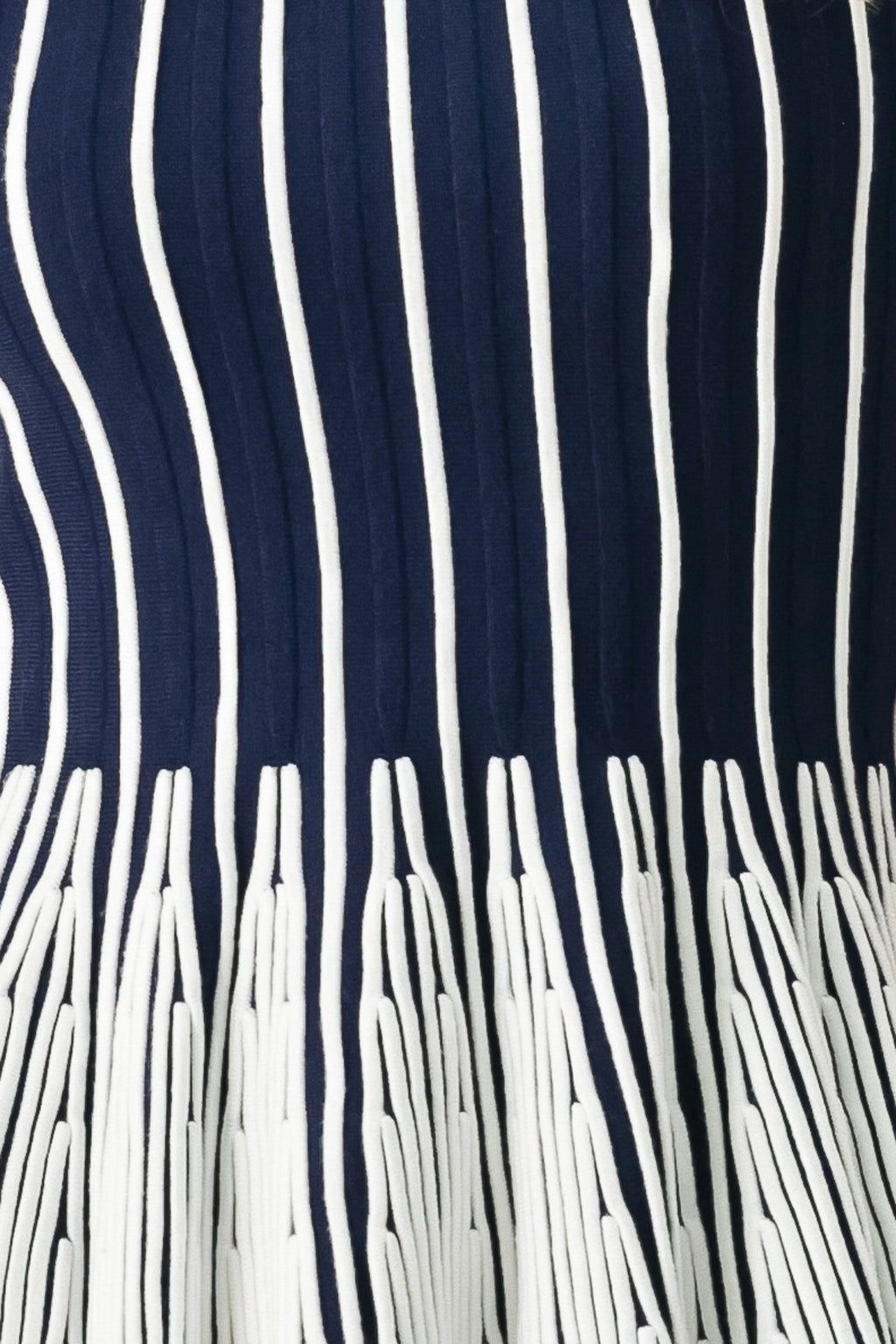 Easy Summer Stripe Sweater Knit Top in Navy White with round neckline, short sleeves, and peplum hem shown on model
