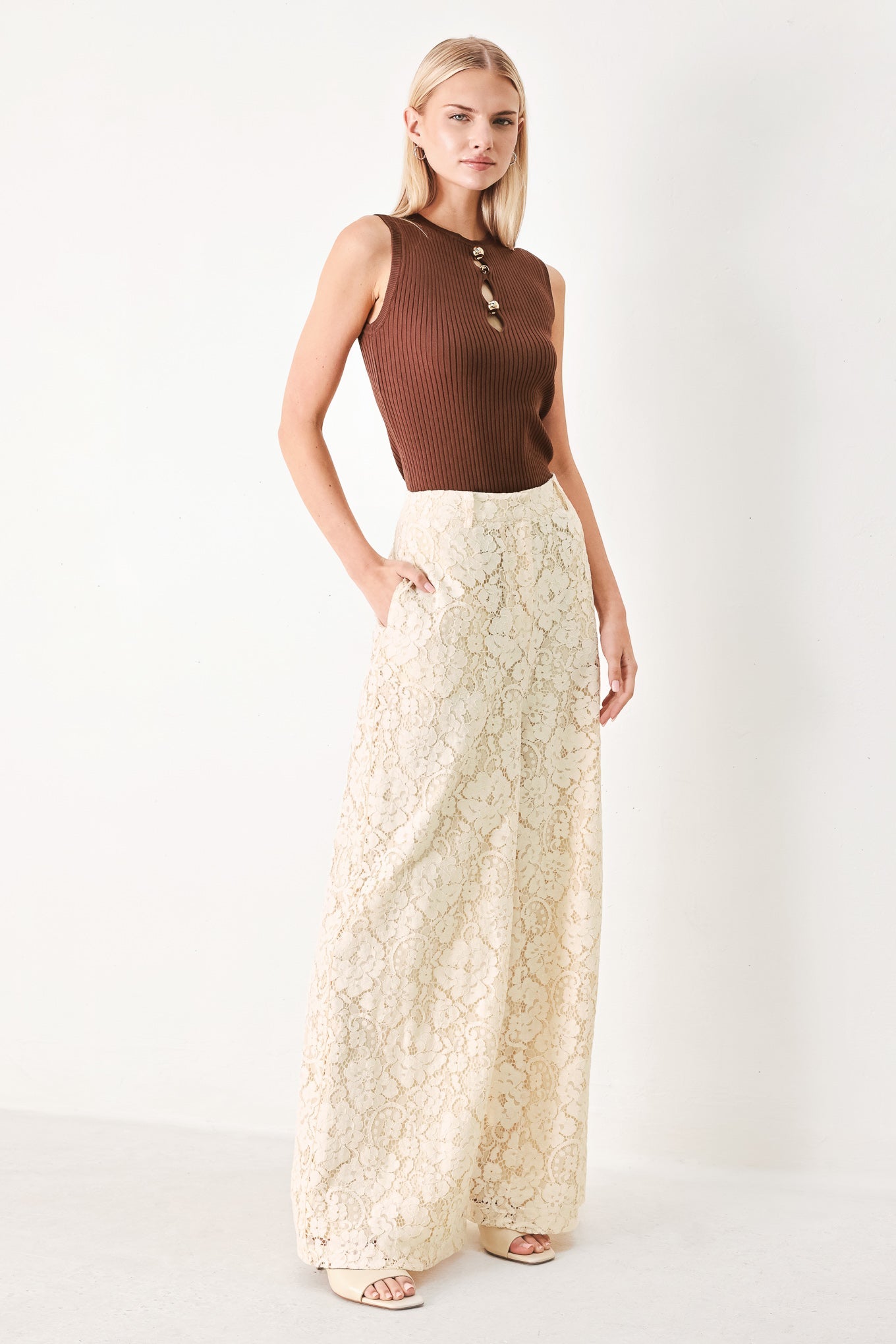 Brown sweater knit top sleeveless silhouette detail