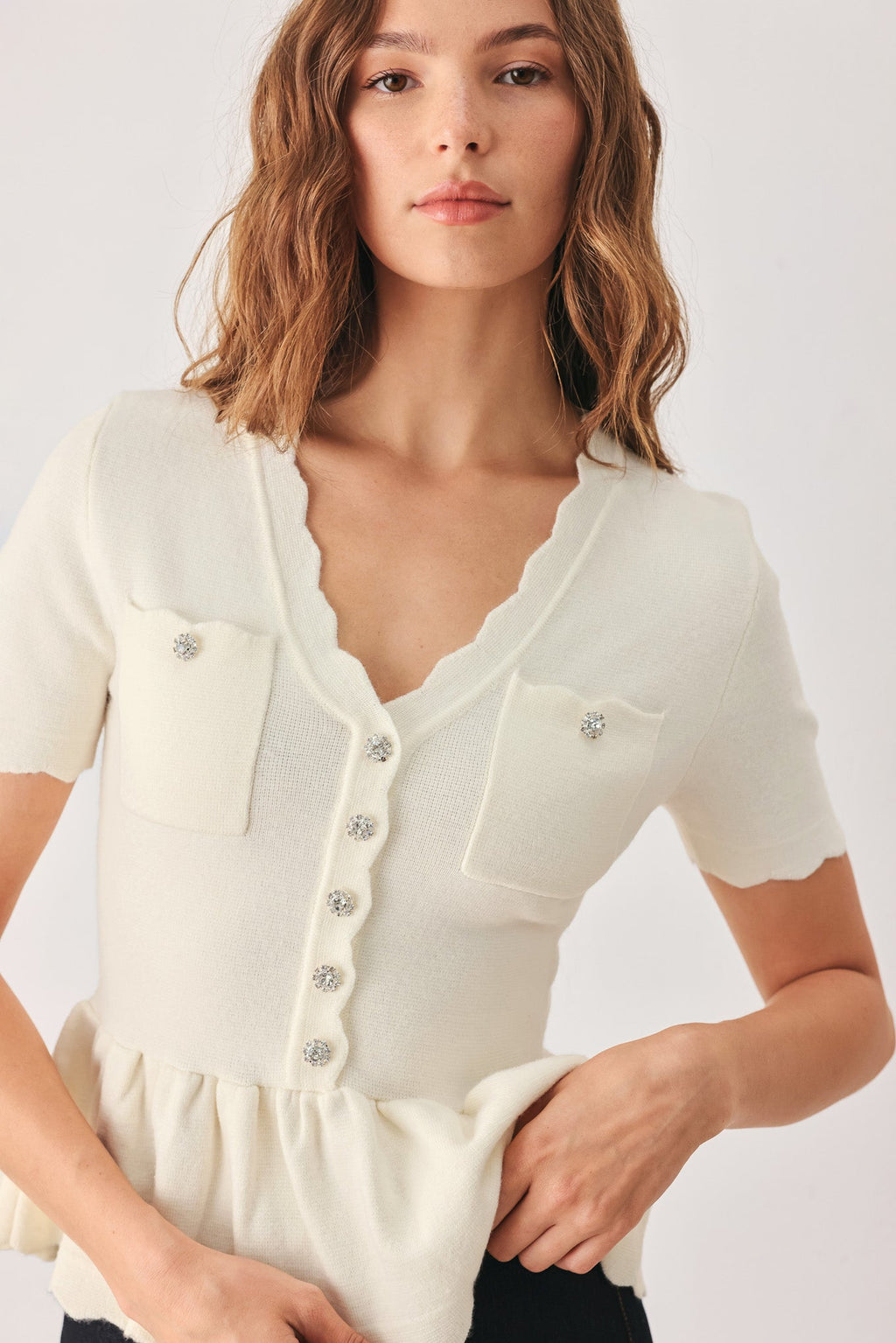 Scalloped V-Neck Peplum Sweater Top in off white, close-up
