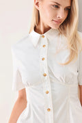 Made for Sunshine Woven Top in Off White with front button closure, short sleeves, and peplum hem shown on model