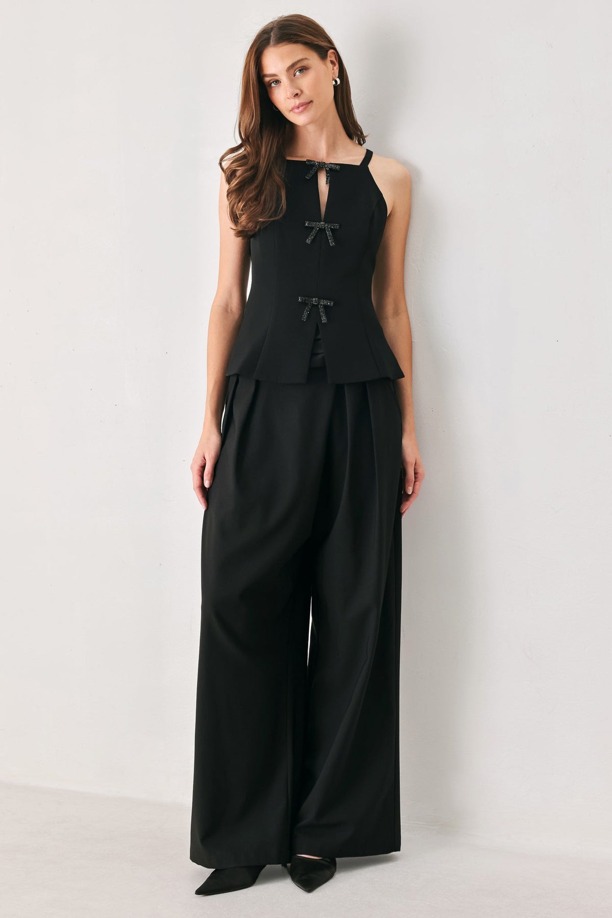 Rhinestone Bow Halter Peplum Top in black, styled view