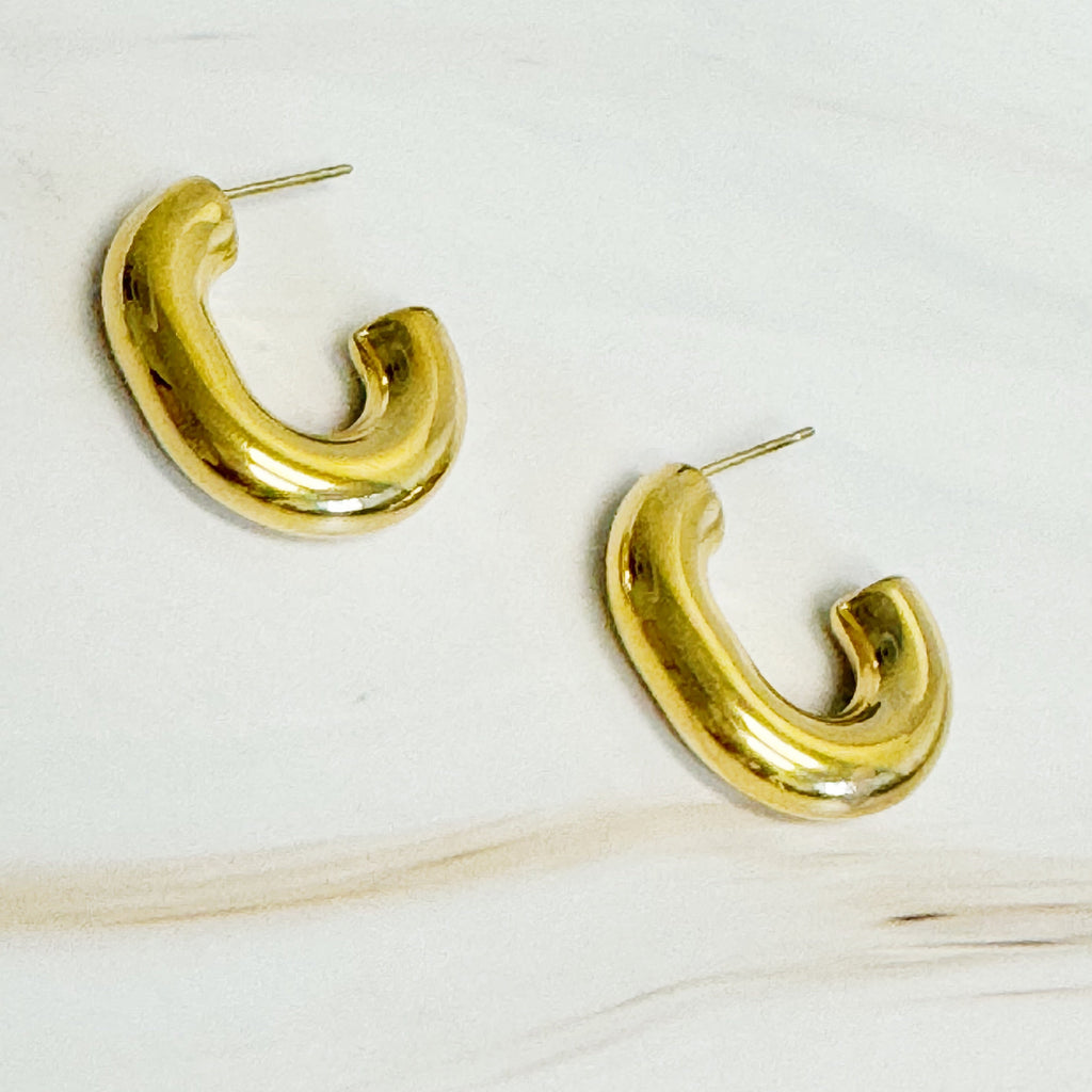 Golden Object Oval Hoop Earrings - both styles flat lay