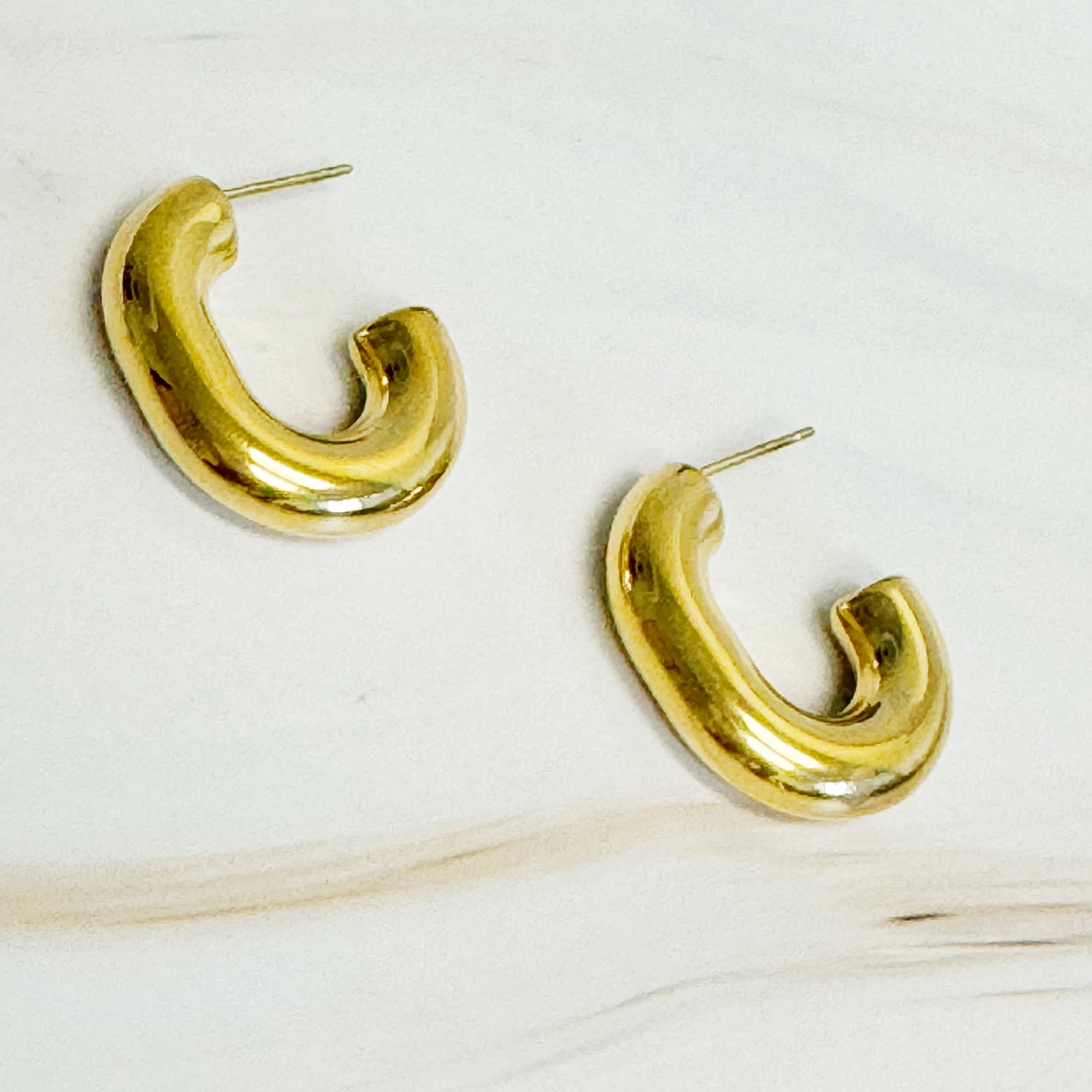 Golden Object Oval Hoop Earrings - both styles flat lay