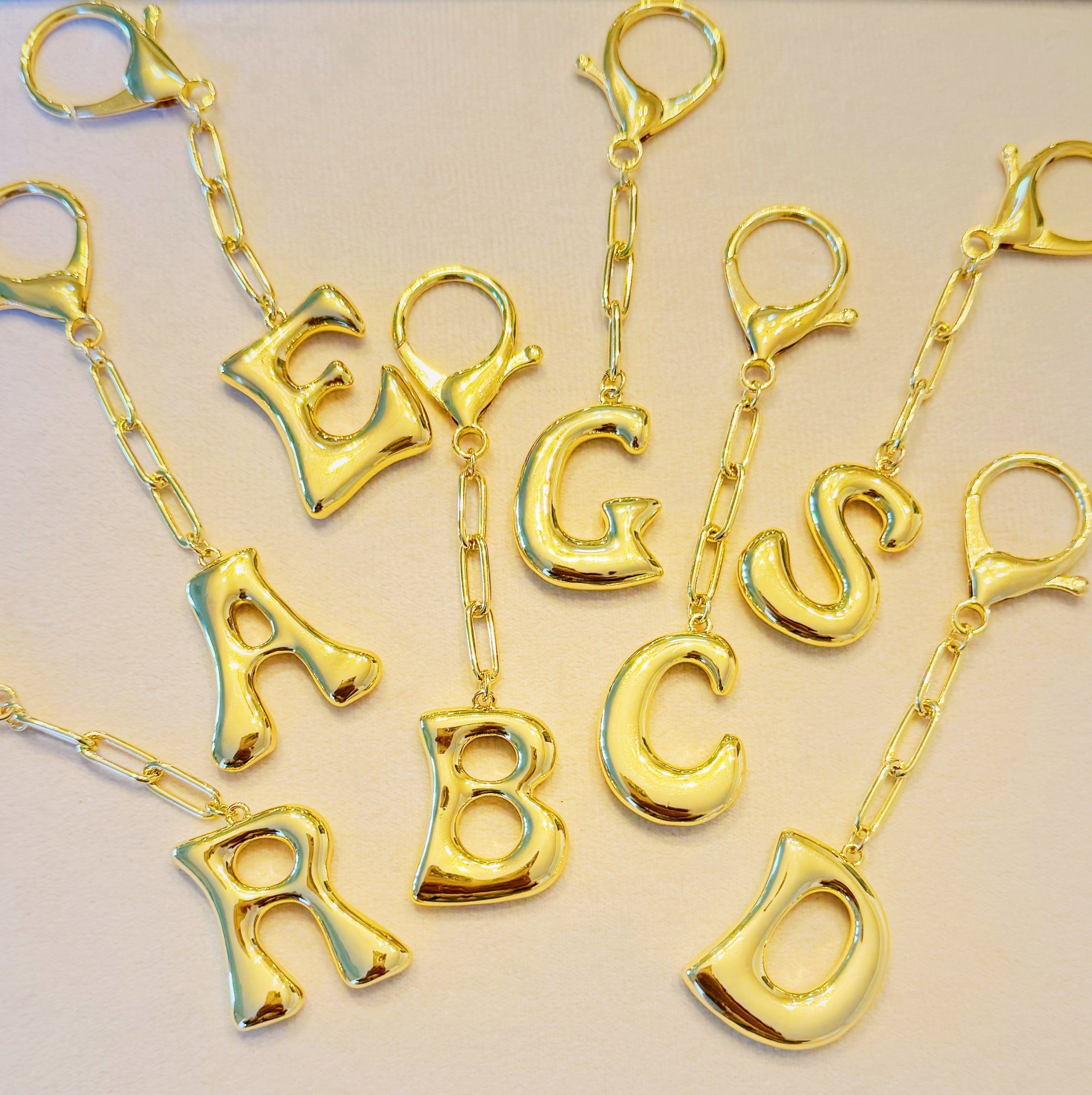 Whimsy Balloon Letter Initial Bag Charm - multiple letter options flat lay