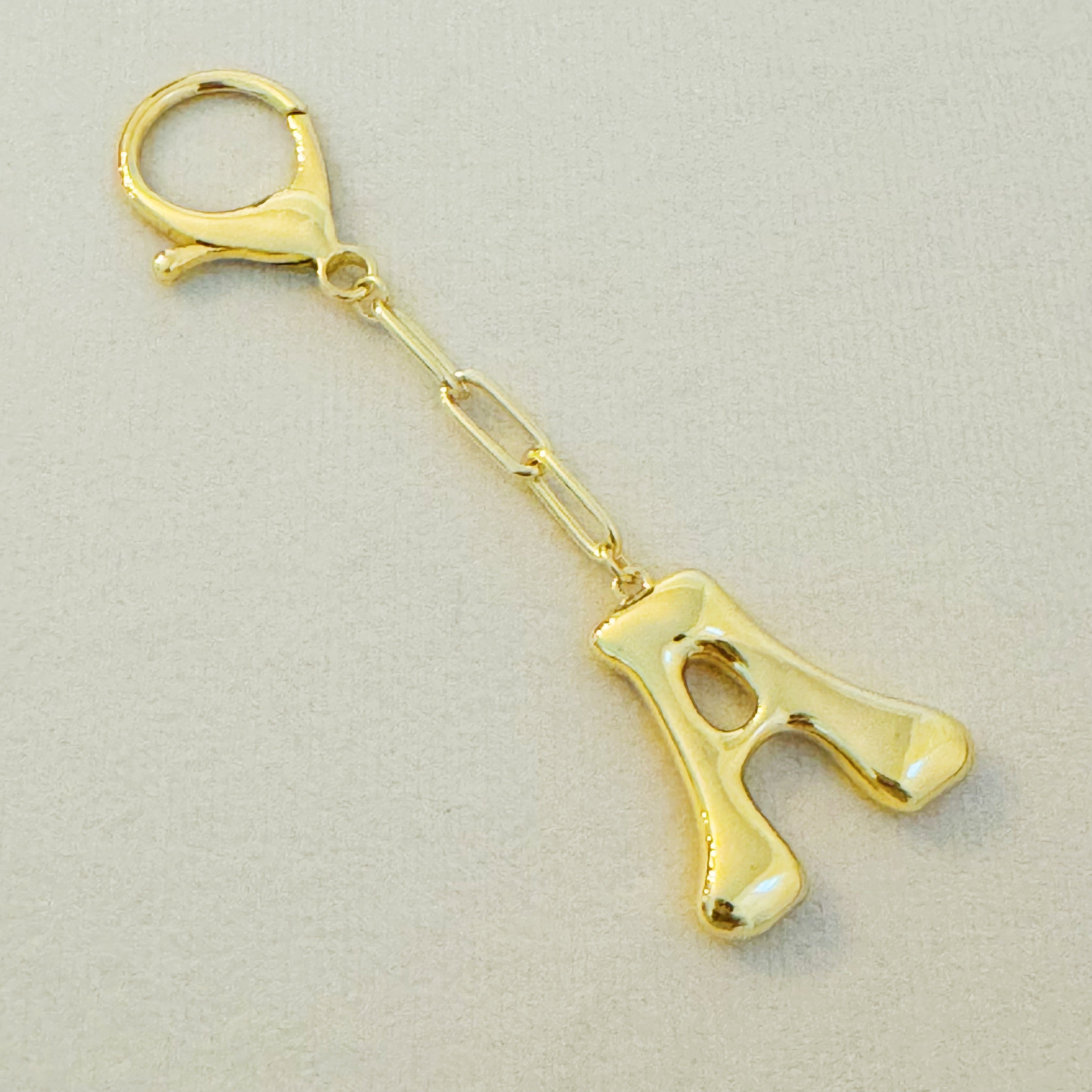 Whimsy Balloon Letter Initial Bag Charm - styled on handbag