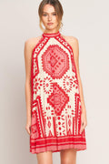 Sunset Medallion Woven Mini Dress in Pink - front view showing halter neckline and pleated skirt