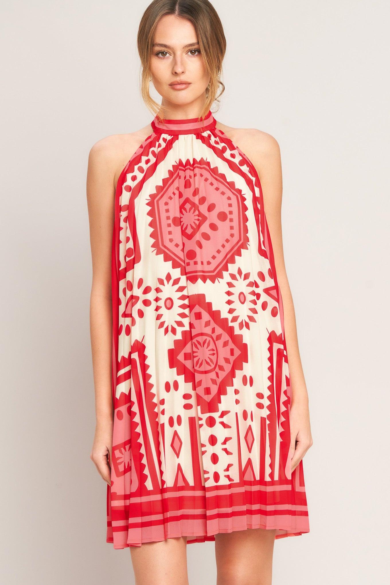 Sunset Medallion Woven Mini Dress in Pink - front view showing halter neckline and pleated skirt