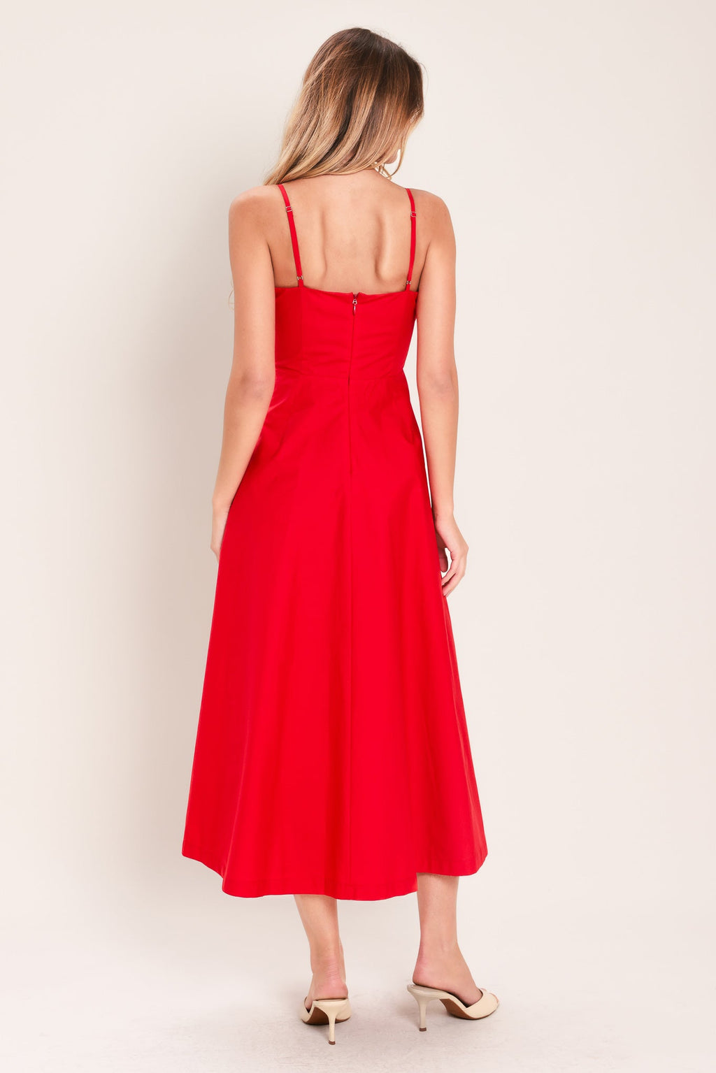 Modern Romance Woven Midi Dress in Red with straight neckline, straps, pleated waistband, circle skirt, and back zipper closure shown on model