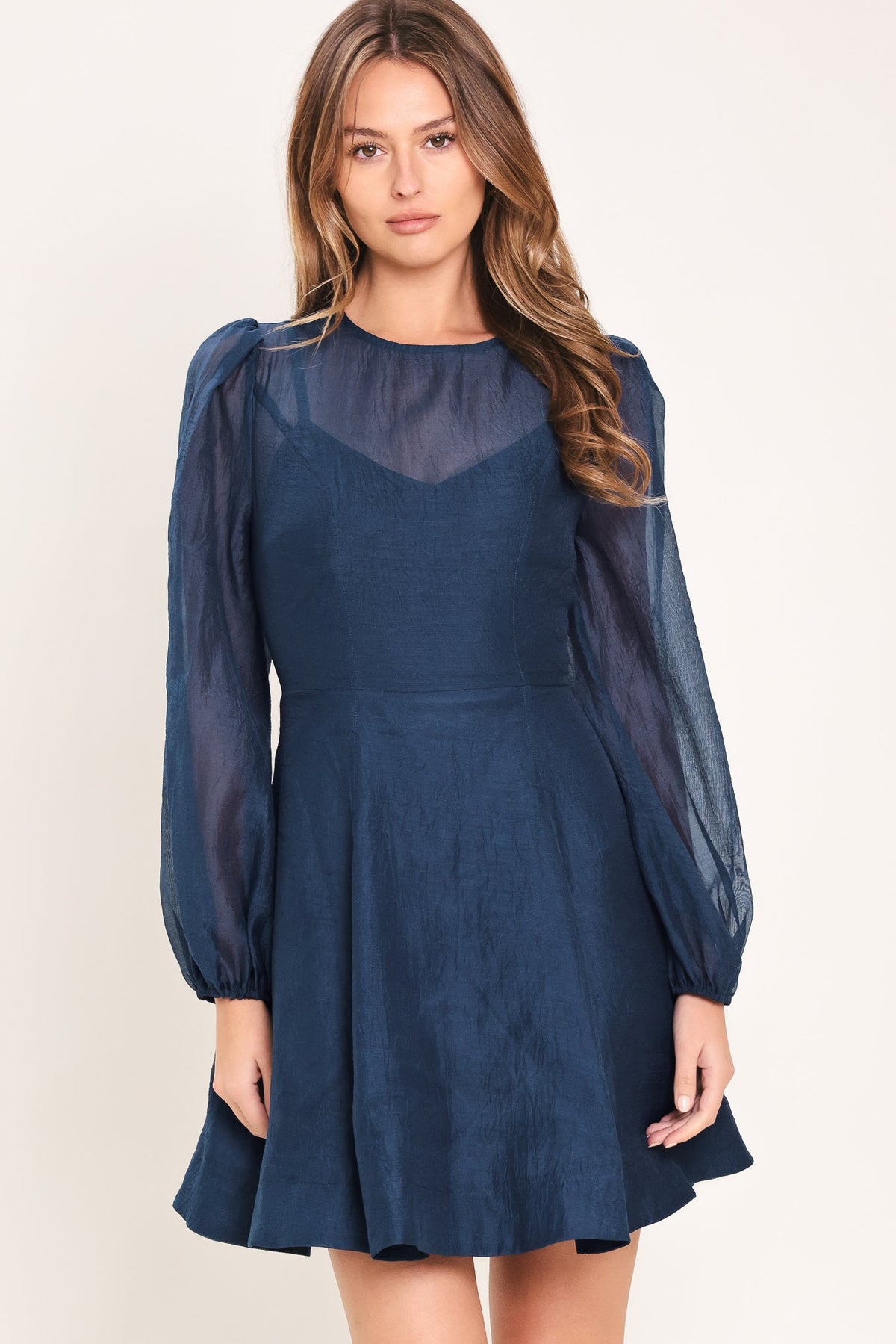 Sheer Sleeve Circle Skirt Mini Dress in navy, front view