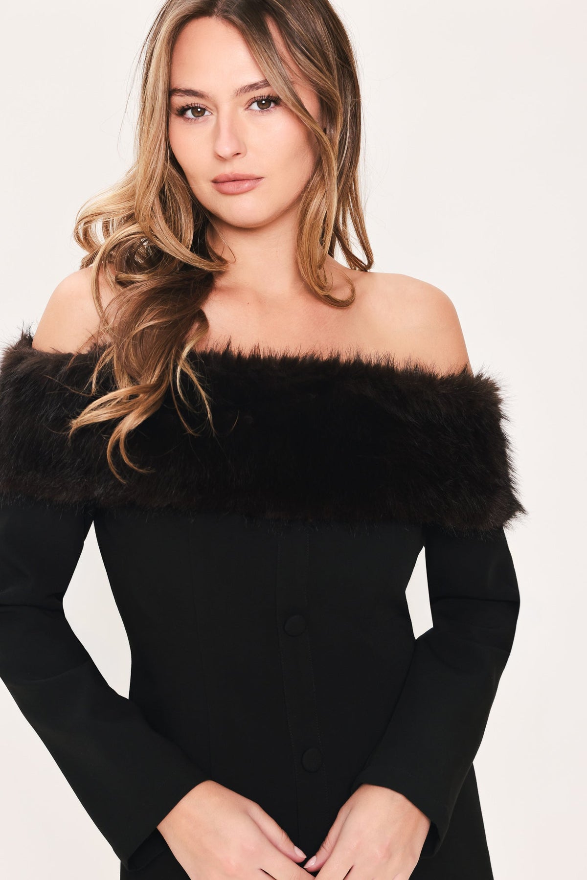 Faux Fur Trim Off-Shoulder Mini Dress in black, styled view
