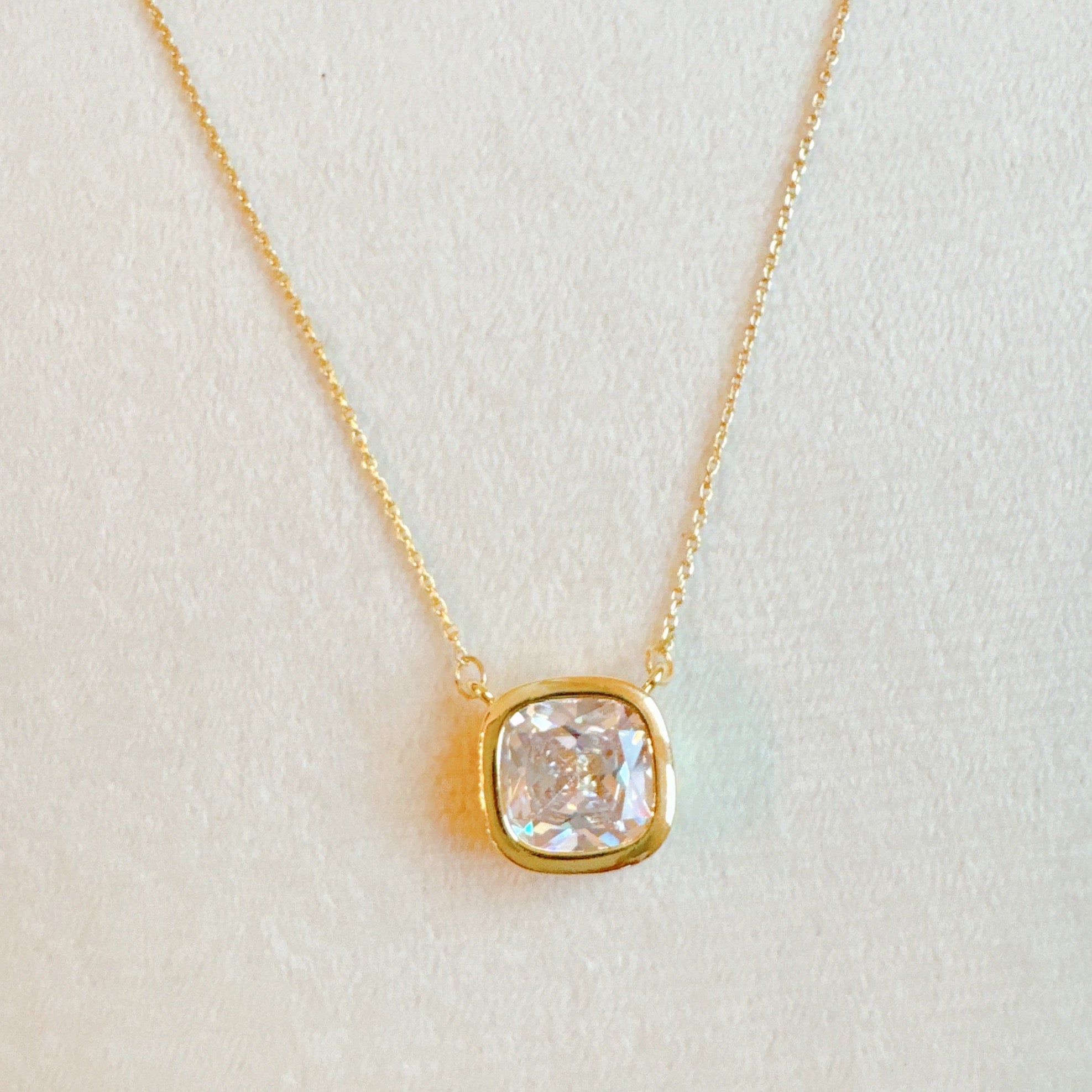 Cushion Cut Bezel Diamond Necklace - close up of bezel setting