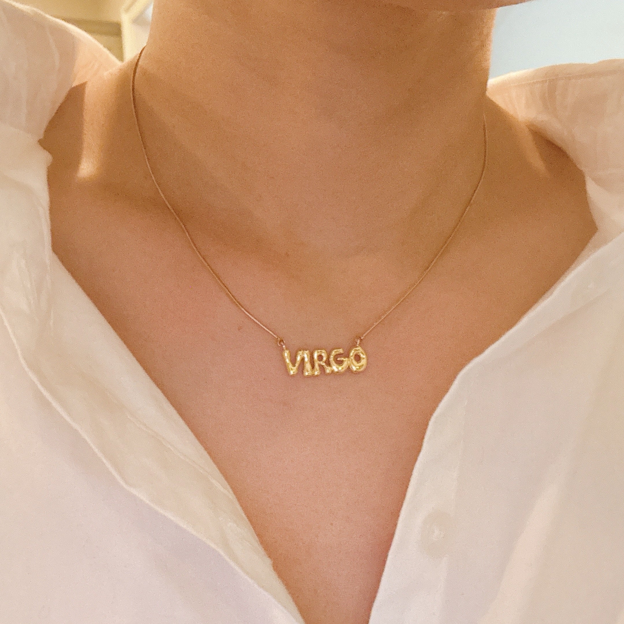 Balloon Letter Zodiac Necklace - styled on model