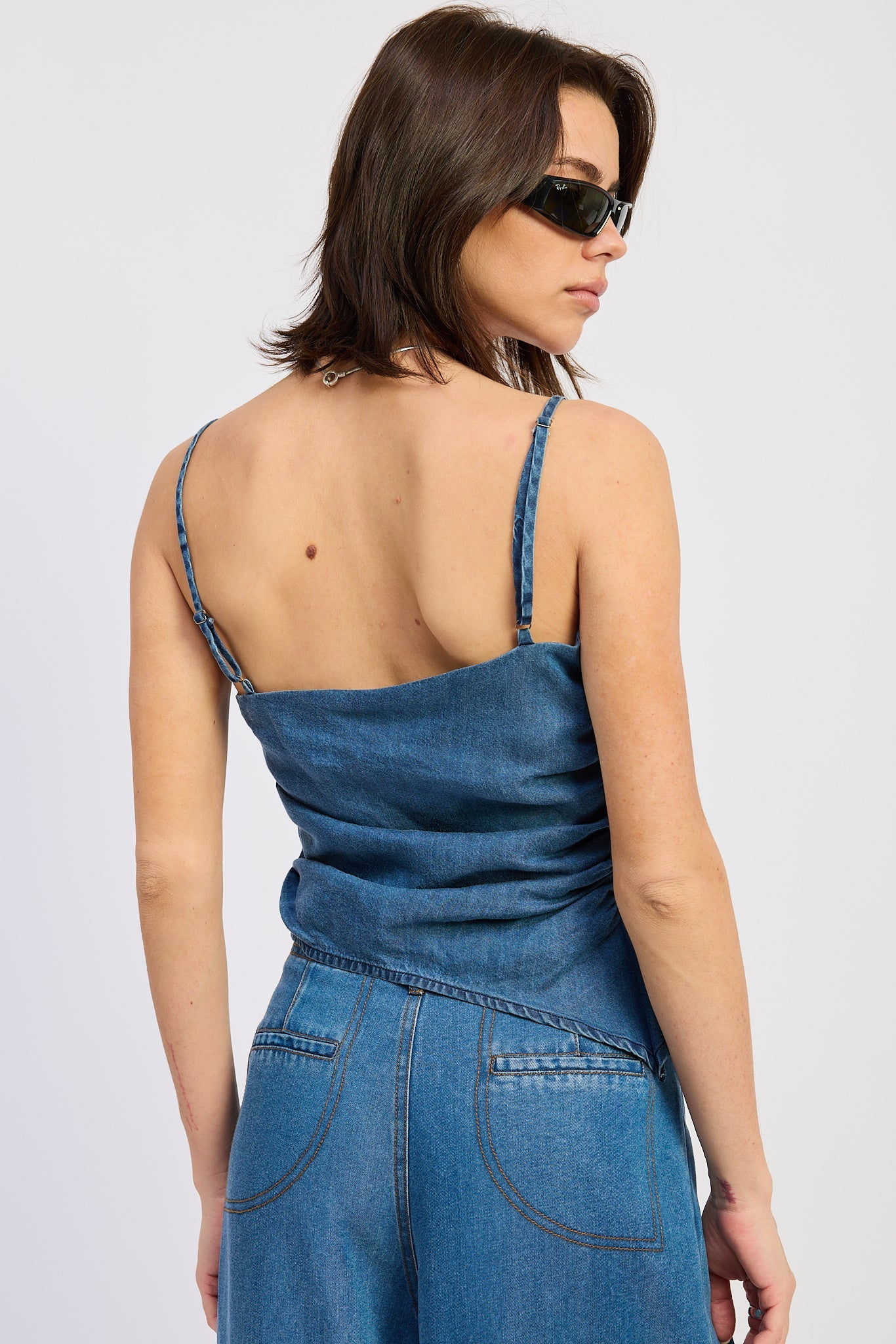 Dakota Top in Denim Blue - side view showing asymmetrical hem