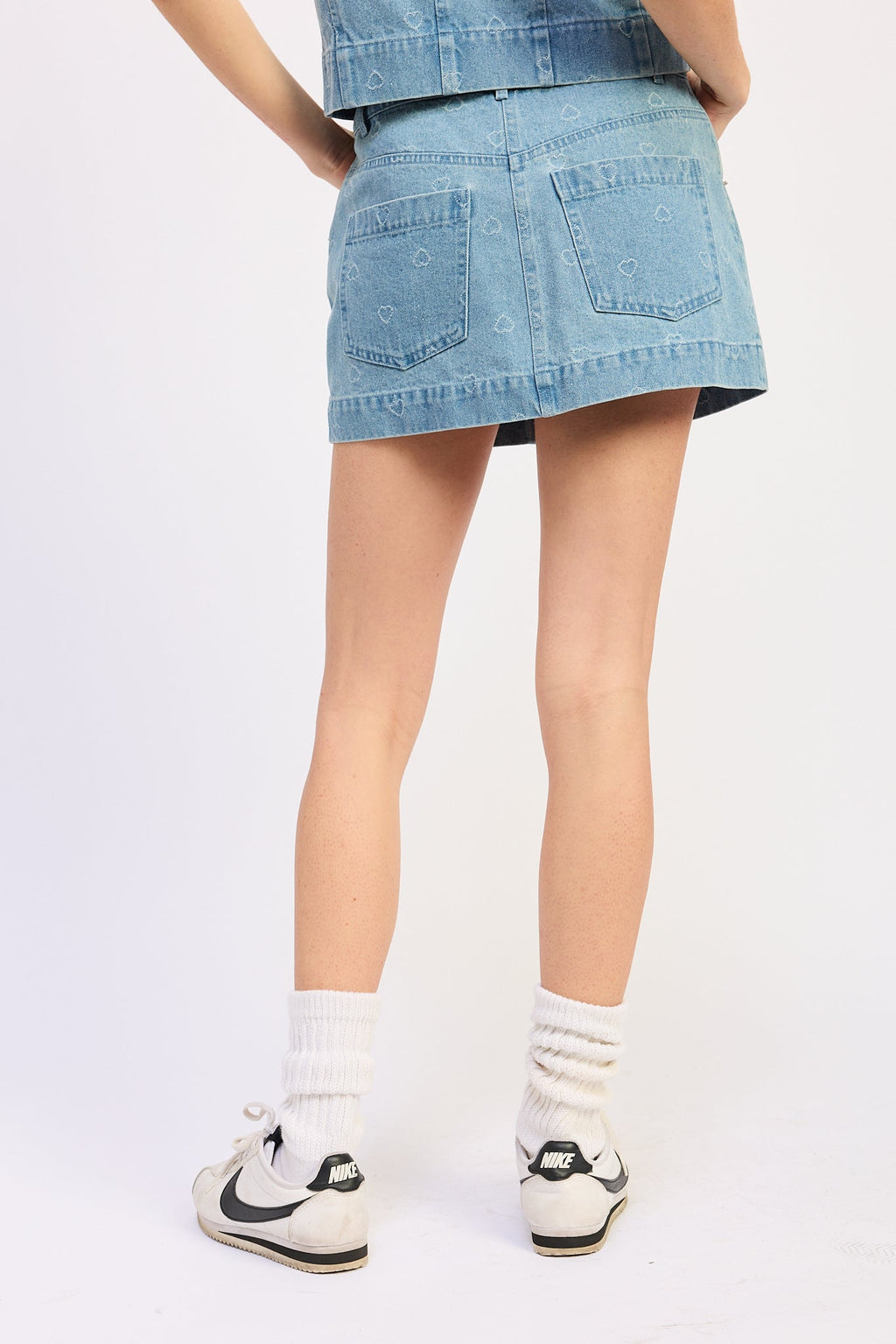 Solene Mini Skirt in Light Blue Denim - styled with matching Solene Tie Top