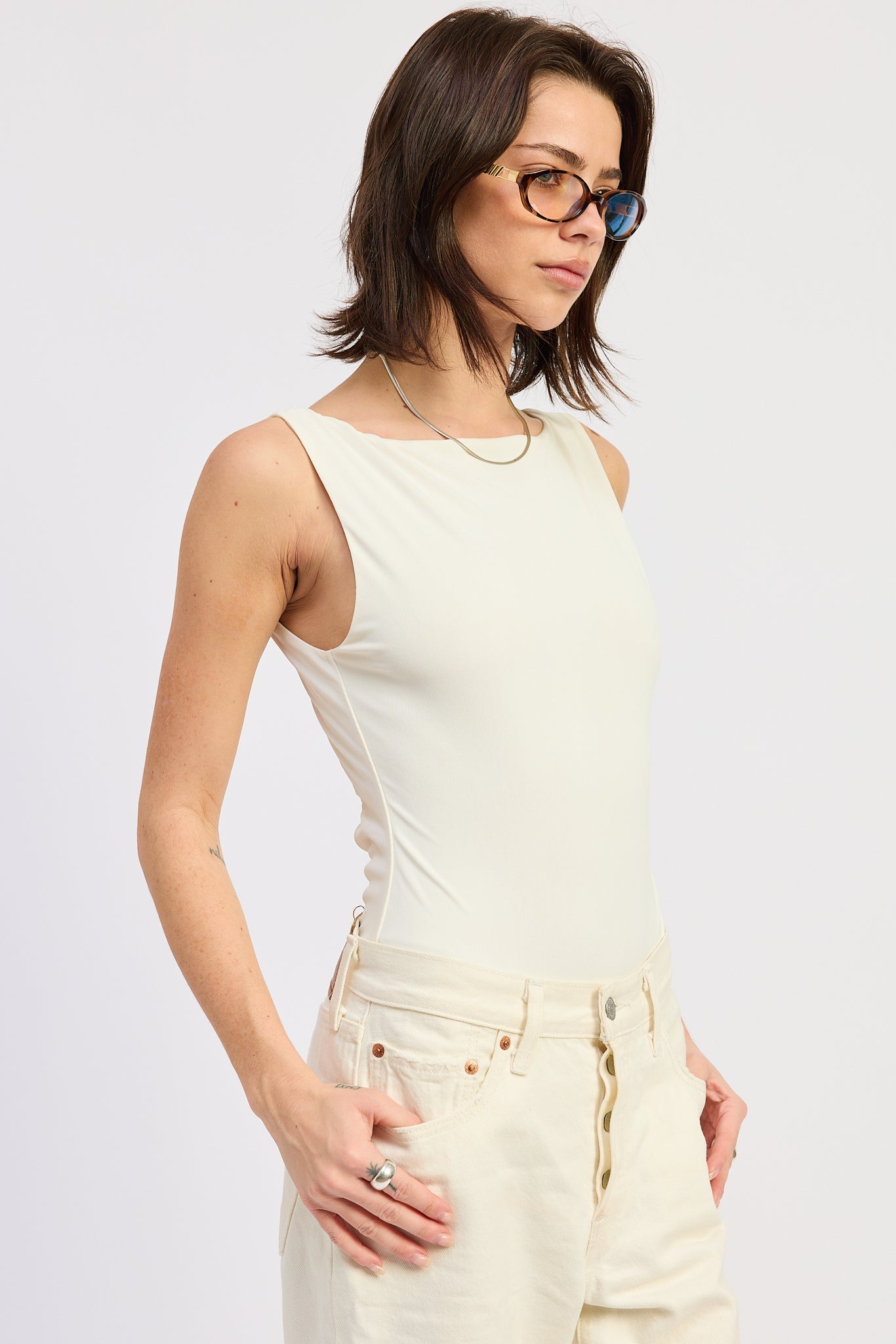 Solara Bodysuit in Black - close up of back trim detail