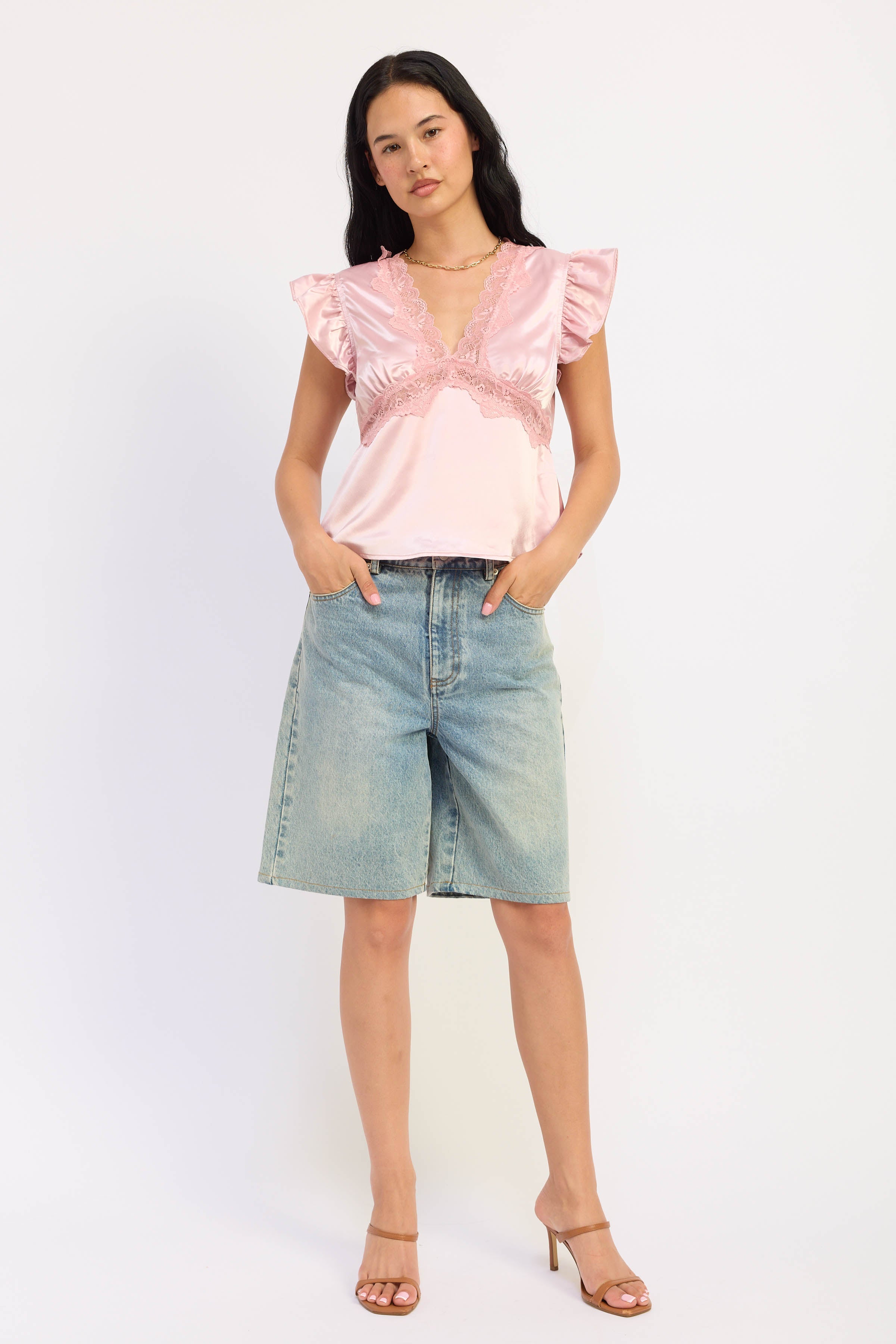 V-Neck Satin Cap Sleeve Top with Lace Trim in pink, worn