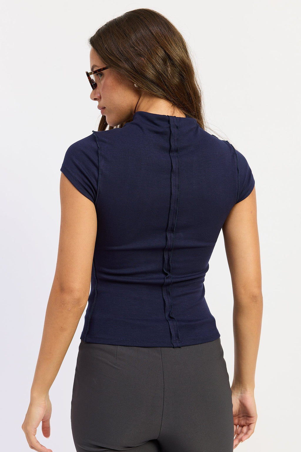 Mock Neck Exposed Seam Knit Top in navy, detail