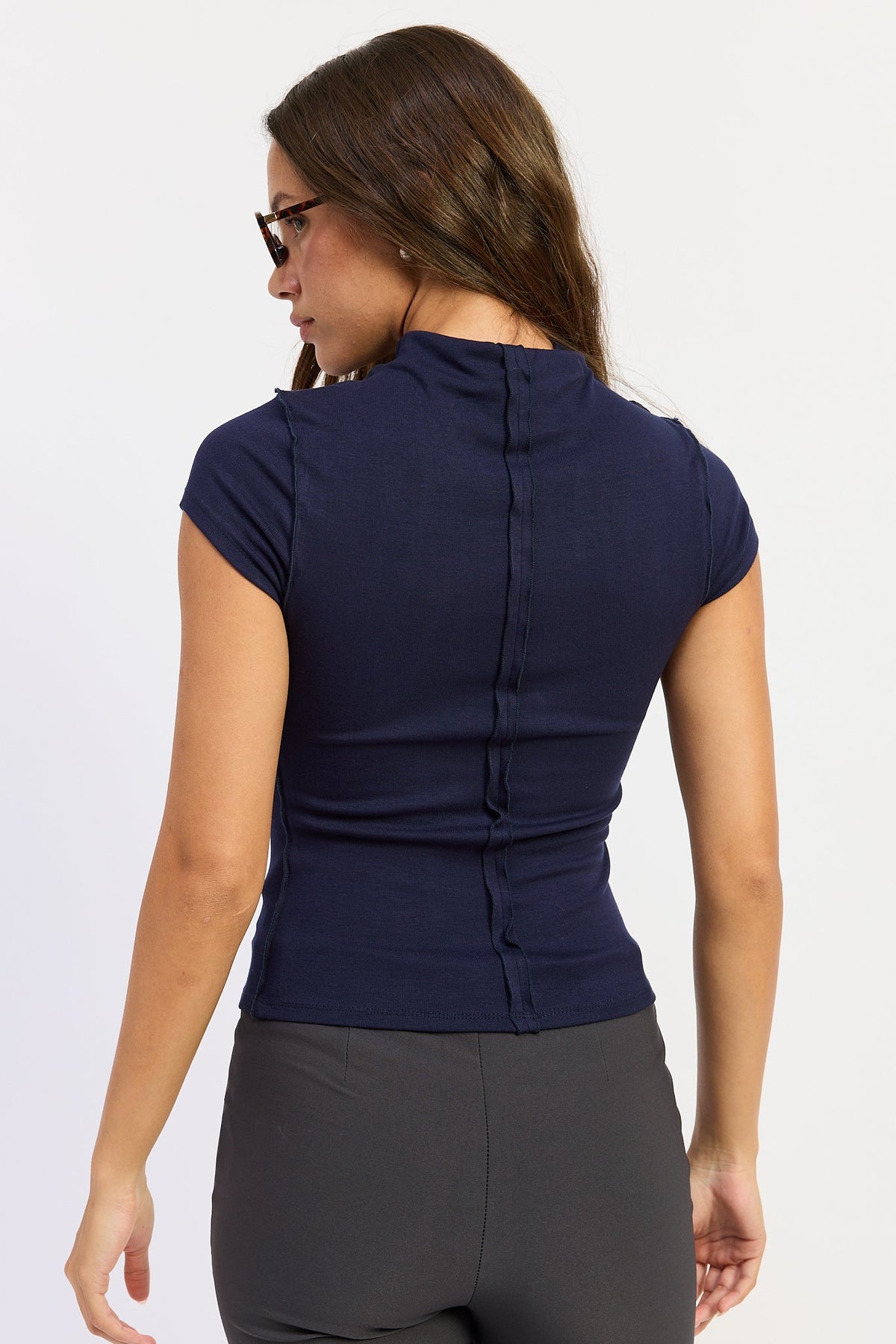 Mock Neck Exposed Seam Knit Top in navy, detail