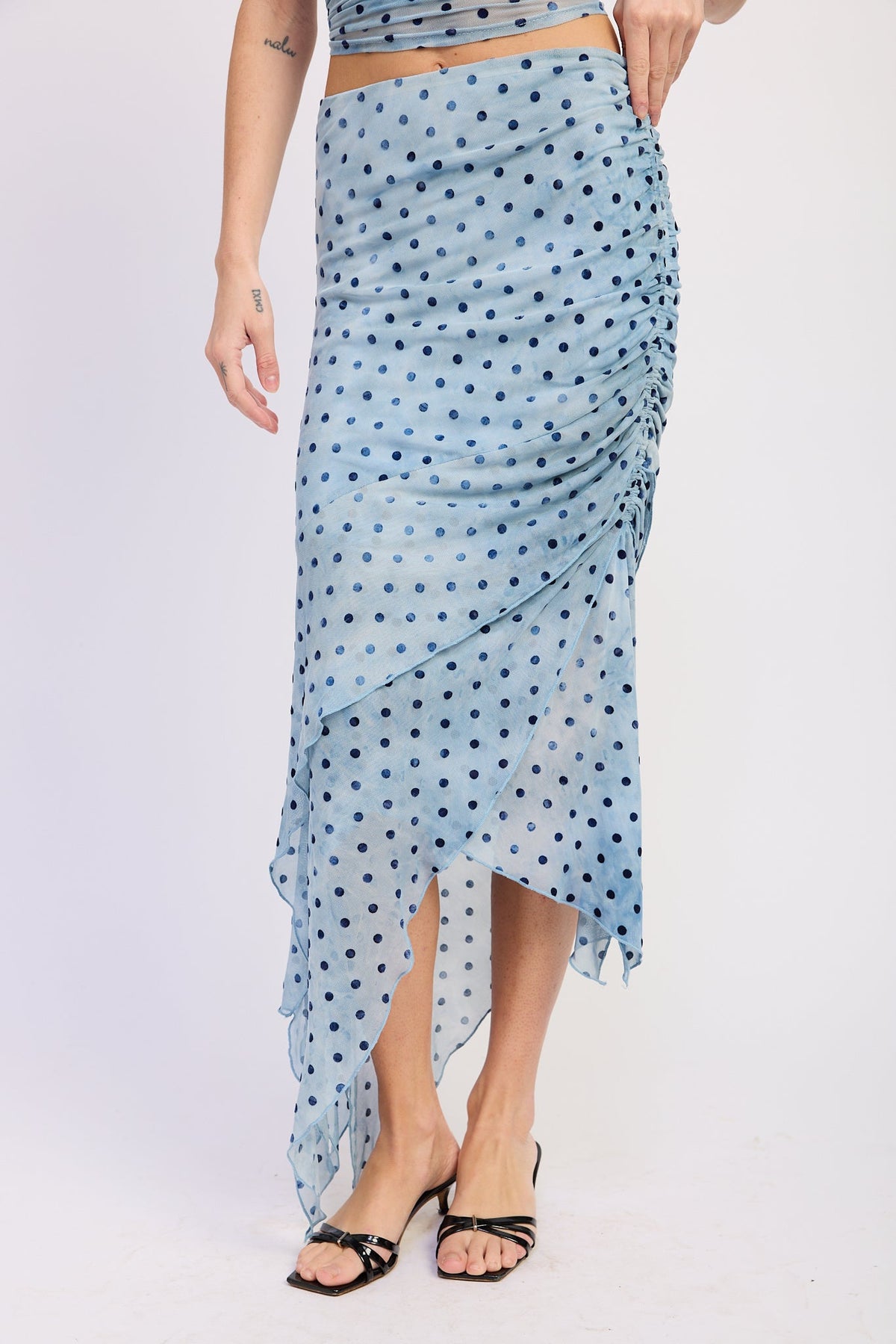 Asymmetrical Merrow Hem Midi Skirt in blue polka dot, close-up