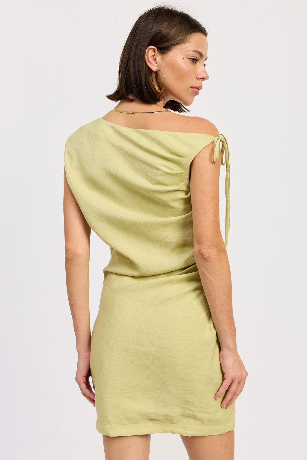 Riven Mini Dress in Lime - close up of side tie detail