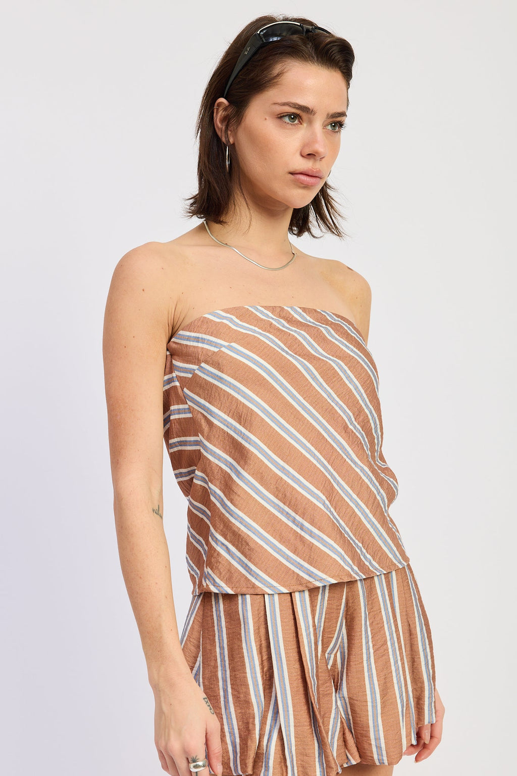 Kenna Top in Tan Blue Stripe - back view showing open back detail