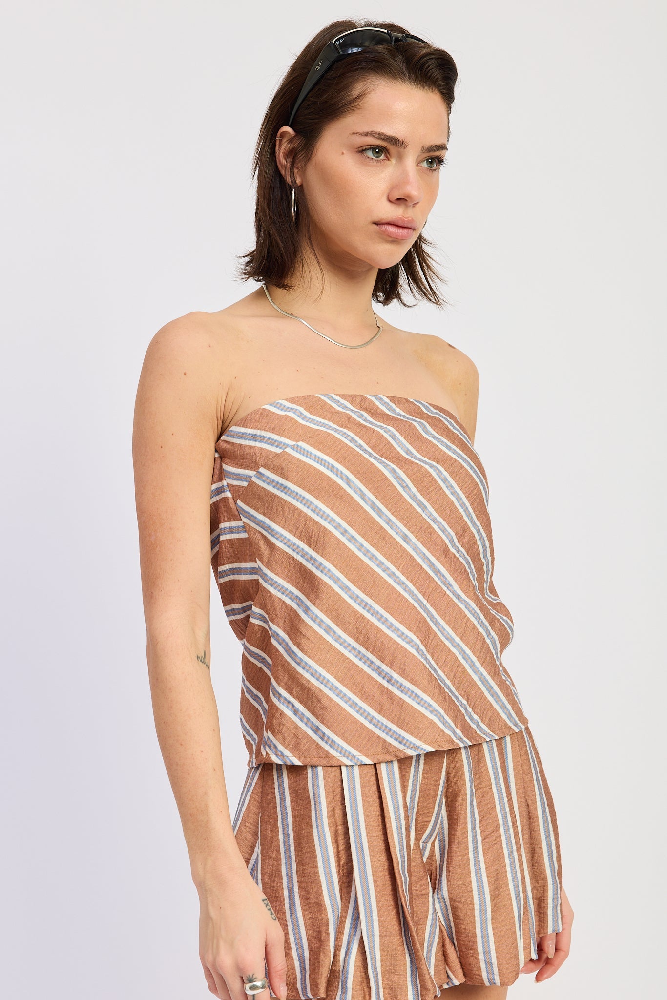 Kenna Top in Tan Blue Stripe - back view showing open back detail